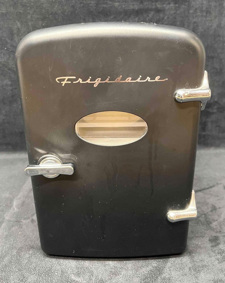 Frigidaire Vintage Style Mini Beauty Fridge Needs Repair: This lot contains a Frigidaire Vintage Style Mini Beauty Fridge. It is approx 11 1/2" x 7" x 10" and it weighs about 4lbs. Overall the Mini Frigidaire Beauty Fridge is in good pre owned condition