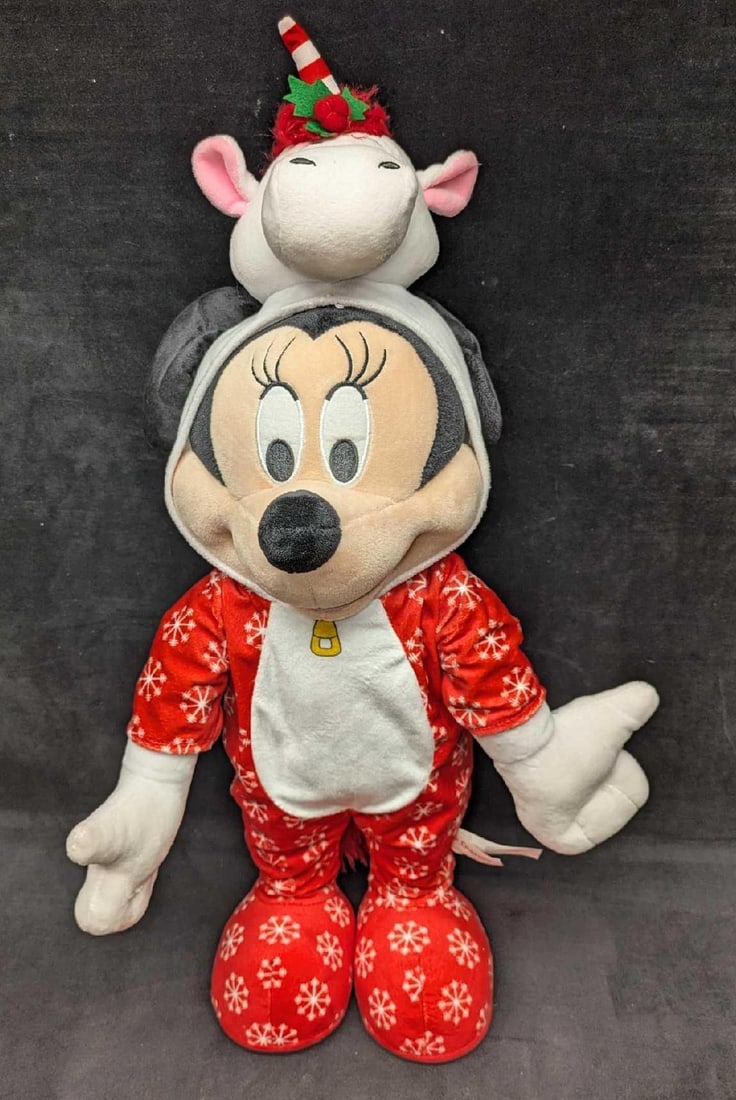 Disney 24" Minnie Mouse Unicorn PJ's Holiday Door Greeter: Disney 24" Minnie Mouse Unicorn PJ's Holiday Door Greeter. This is approx 15 1/2" x 10" x 24 1/2" and it weighs 2.10lbs. The unicorn hat is slightly loose and a stitch can be seen.