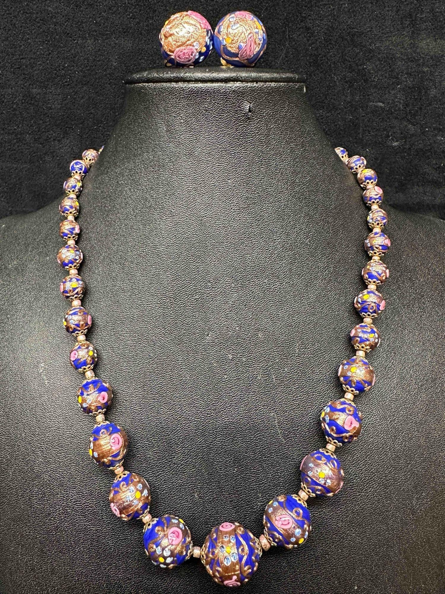 Murano Venetian Lamp Work Glass Dark Blue Copper Accents Beaded Floral Necklace and Earrings Set F17: Murano Venetian Lamp Work Glass Dark Blue Copper Accents Beaded Floral Necklace and Earrings Set F17. Necklace and earrings with dark blue colored glass beads with beautiful hand painted floral design