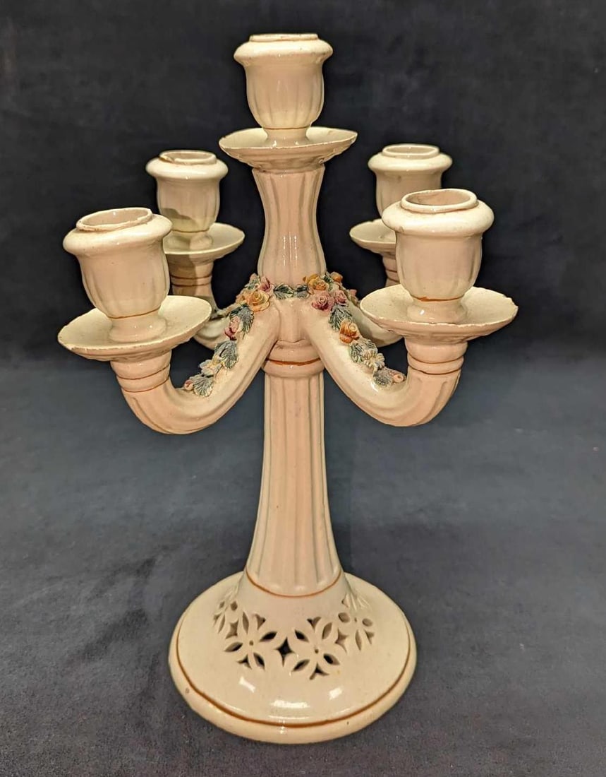 Vintage Italian Porcelain Flower Candelabra: Vintage Italian Porcelain Flower Candelabra. This is approx 8" x 8" x 13 1/2" and it weighs 2.50 lbs. The Candelabra has chips and some wax residue. Please see the images as they are part of the