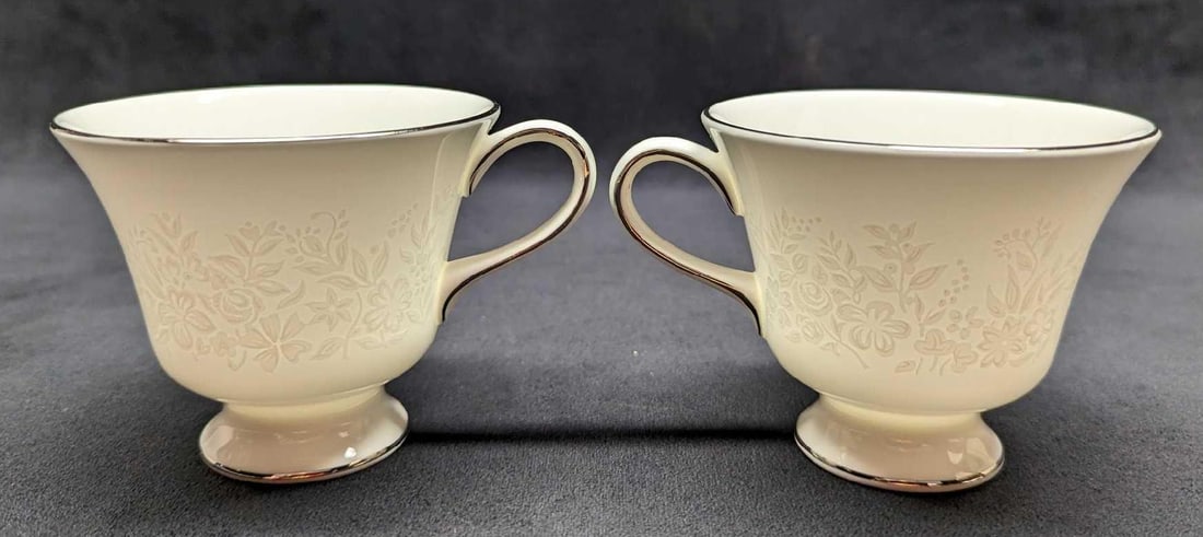 2 Wedgwood China Silver Ermine Contour Footed Cups B: 2 Wedgwood China Silver Ermine Contour Footed Cup B. This series was released from 1971 - 1993. Each cup is approx 4 1/2" x 3 1/2" x 3" and the total weight is 0.59lbs. The footed cups are