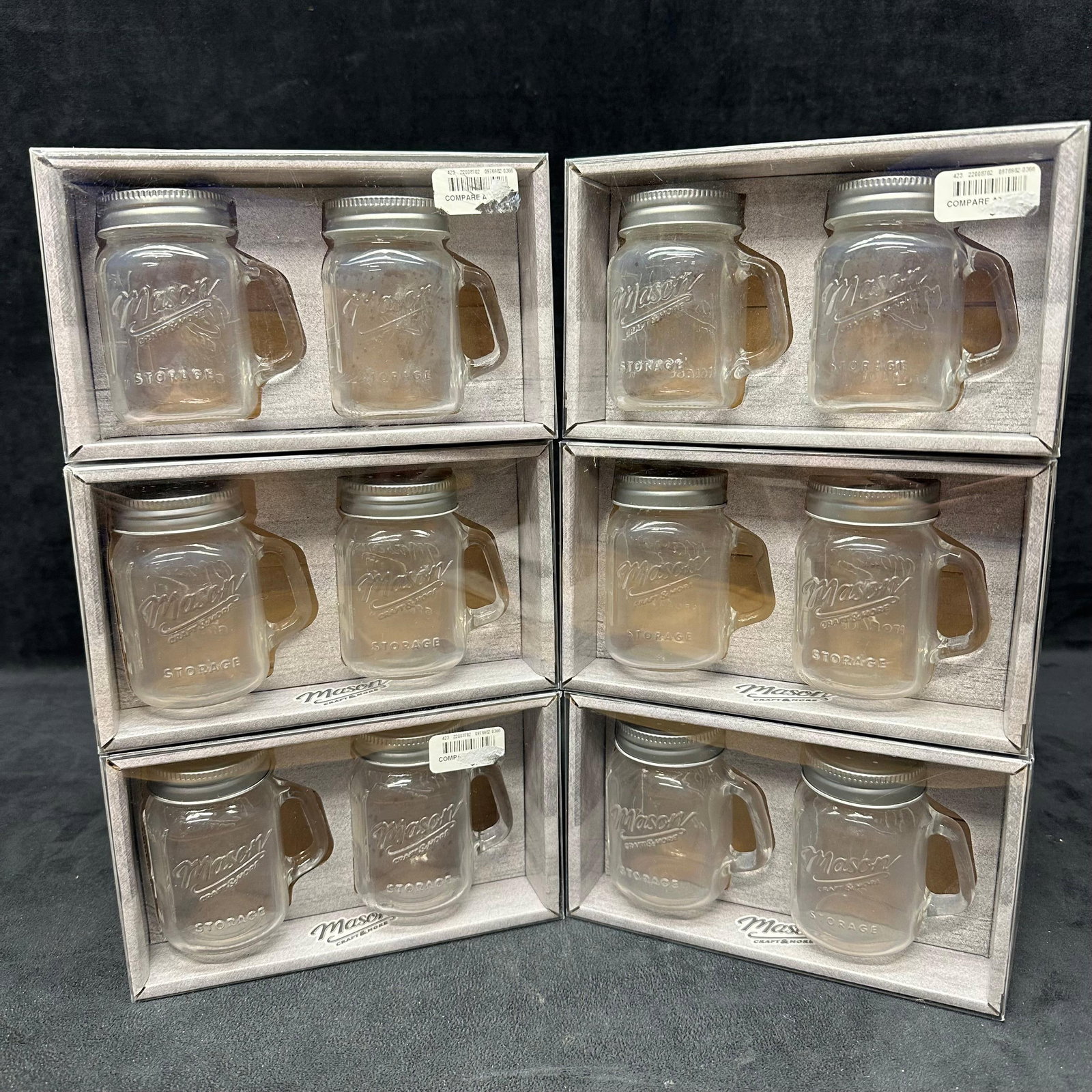 Mason Craft and More Glass Mason Jar Salt and Pepper Shaker Sets New: Lot includes six boxed pairs of Mason Craft and More glass salt and pepper shakers, each designed in the classic mini Mason jar style with handle and screw-top lid. Durable glass construction with emb