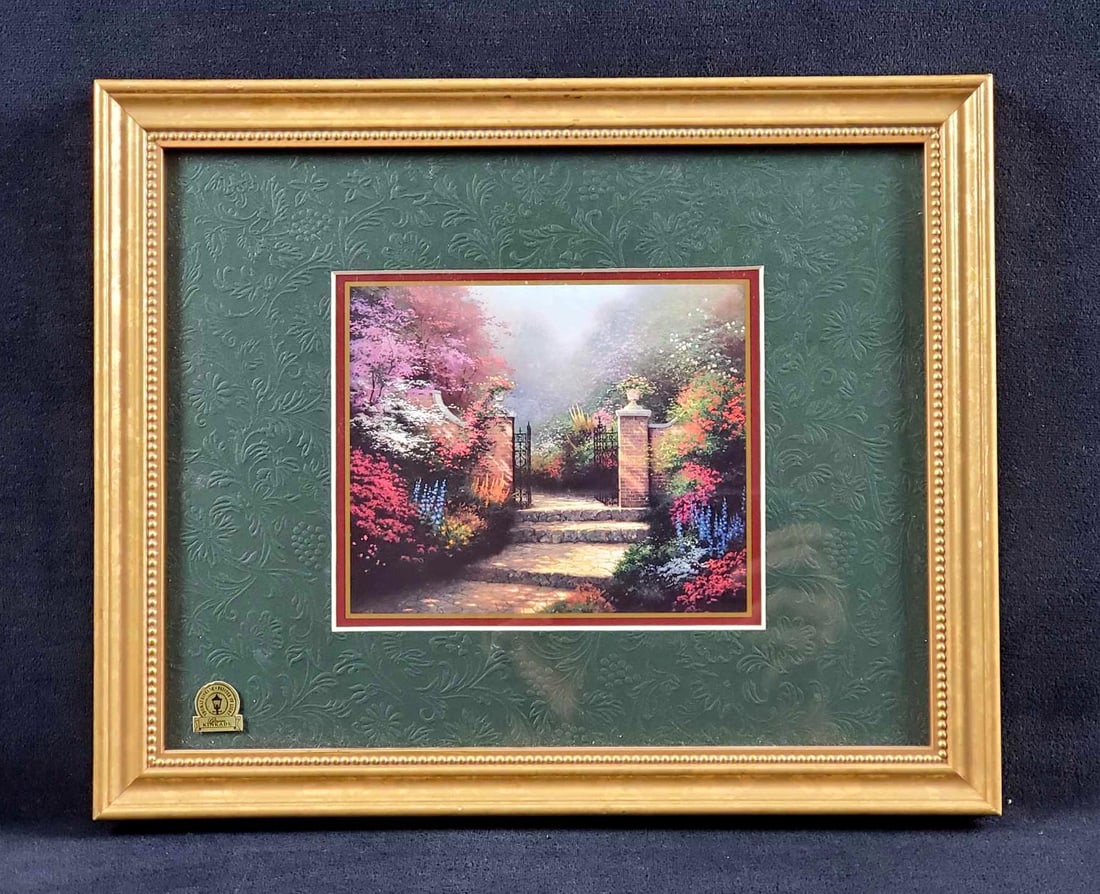 The Victorian Garden by Kinkade 1992: This reproduction print of Kinkade's Victorian Garden, was published in 1992 and the location of his inspiration was England. This is a sold out piece. Printed gold and burgundy border with a text