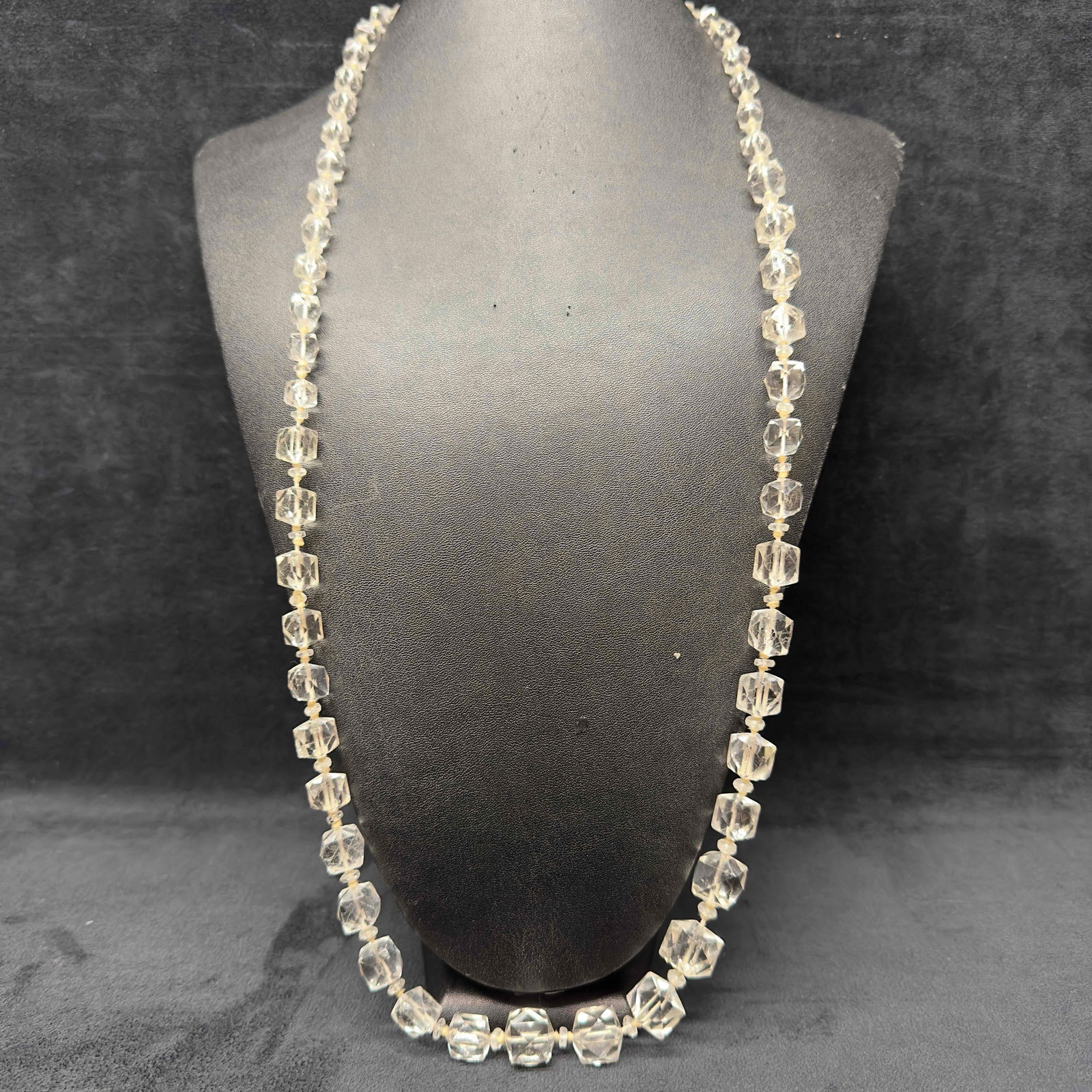 Clear Crystal Glass Bead Costume Jewelry Square Faceted Beaded Long Necklace I24: Clear Crystal Glass Bead Costume Jewelry Square Faceted Beaded Long Necklace I24. Necklace clear glass beads with beautifully shaped designs on each. The necklace is long and can be worn as a double s