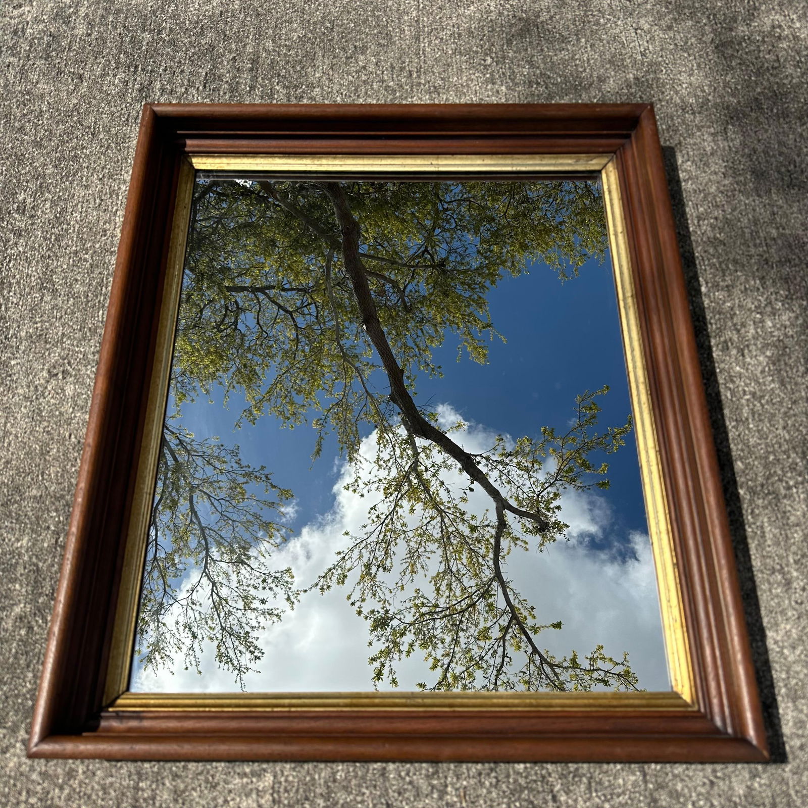 Vintage Framed Wall Mirror with Wood Frame and Gilt Gold Liner: Vintage rectangular wall mirror featuring a molded wood frame with a warm brown finish and an inner gilt liner. The frame has a stepped profile with simple classical styling suitable for traditional o