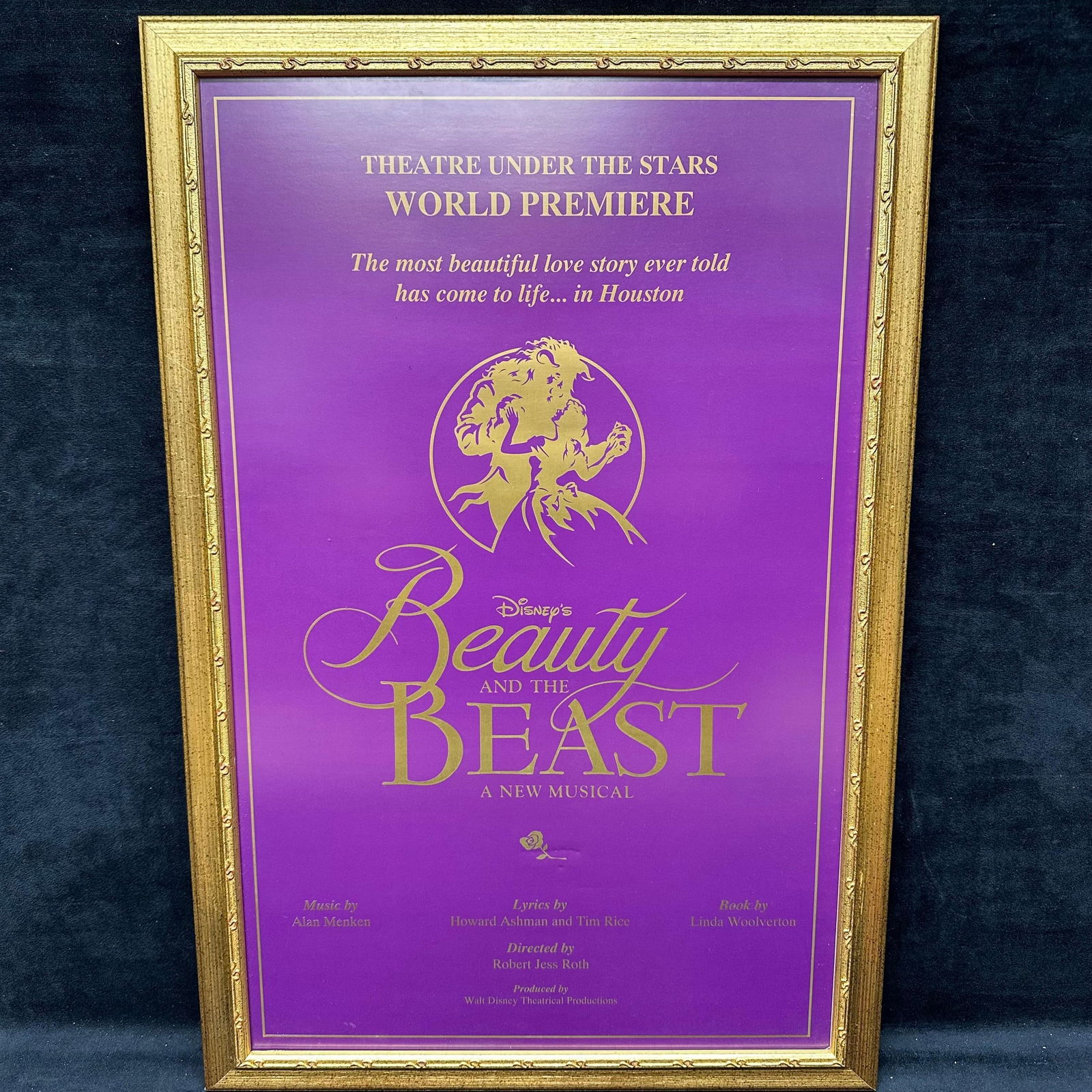 Disney Beauty and the Beast World Premiere Theatre Poster A New Musical Framed Purple Gold: Original Beauty and the Beast World Premiere poster from Theatre Under the Stars in Houston, Texas. Features elegant gold lettering on a purple background with the iconic silhouette of Belle and the B