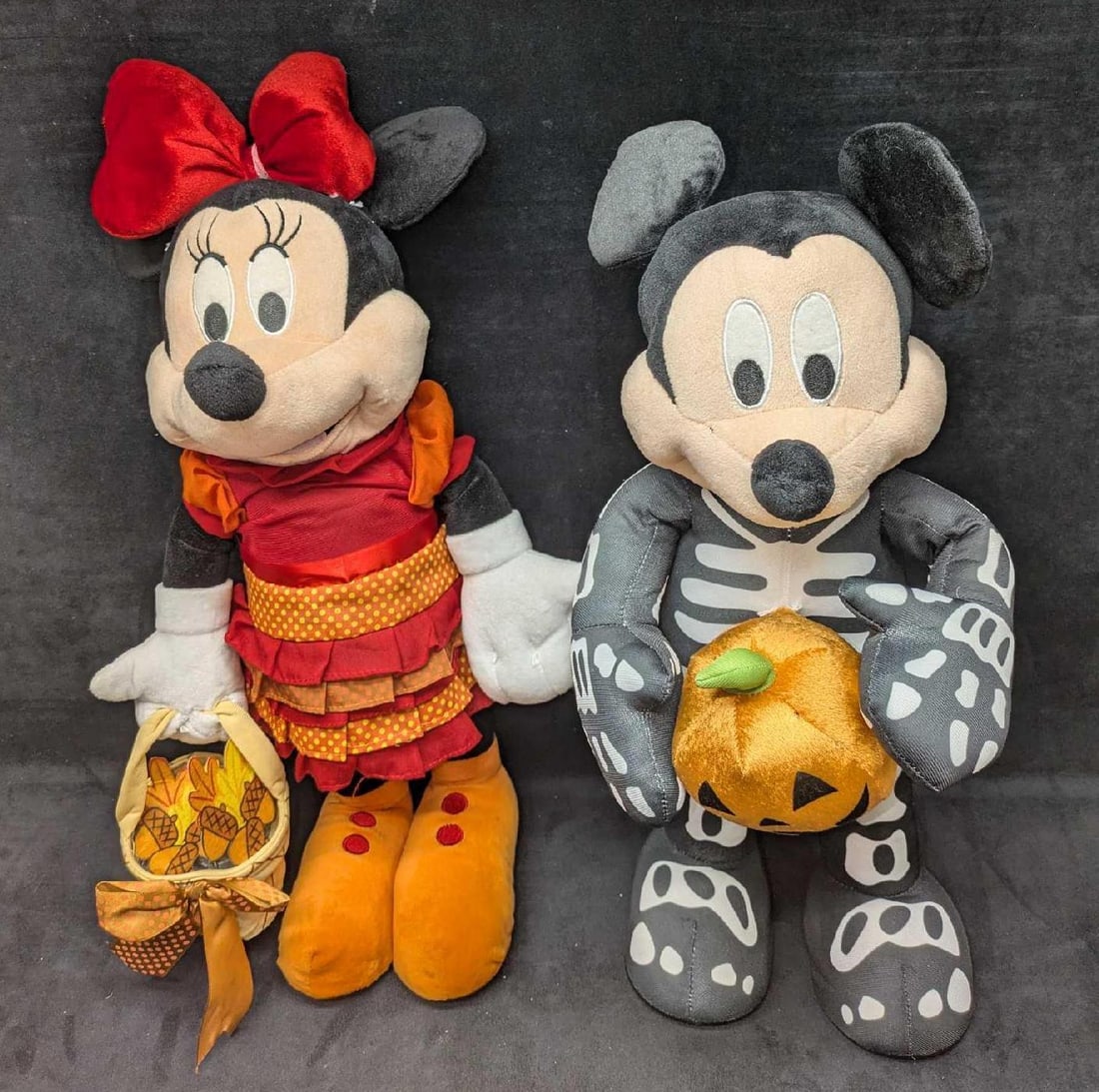 Disney Skeleton Mickey & Autumn Minnie Mouse Greeters: Disney Skeleton Mickey & Autumn Minnie Mouse Greeters. Mickey is approx 13" x 9" x 23" and Minnie is approx 10" x 8" x 22" and the total weight is 1.50lbs. There are some light wrinkles on the greeter