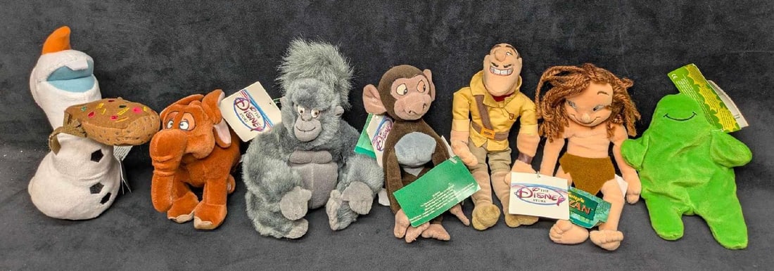 Disney Tarzan Frozen Flubber Bean Bag Lot of 7: Disney Tarzan Frozen Flubber Bean Bag Lot of 7. Please see the images for a listing of character bean bags. Please note, some have battery powered features that no longer work. All come in a bag that