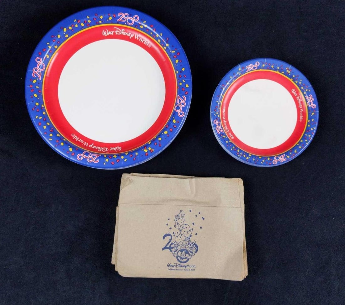 Disney World 2000 Celebration Plates And Napkins: This lot consists of paper plates and napkins that were used at most of the Fast Service restaurants during the year 2000 at the Walt Disney Resort in Orlando, Florida. (16) Disney 2000 Plates. Plate