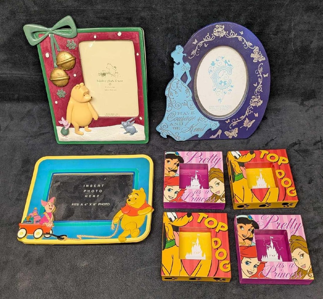 7 Disney Princess Winnie The Pooh Pluto Photo Frames: 7 Disney Princess Winnie The Pooh Pluto Photo Frames. This lot includes: (2) Pluto Top Dog Photo Frames. Fits 2" x 2" photos. Each frame is approx 4" x 4" x 1". One has a small de
