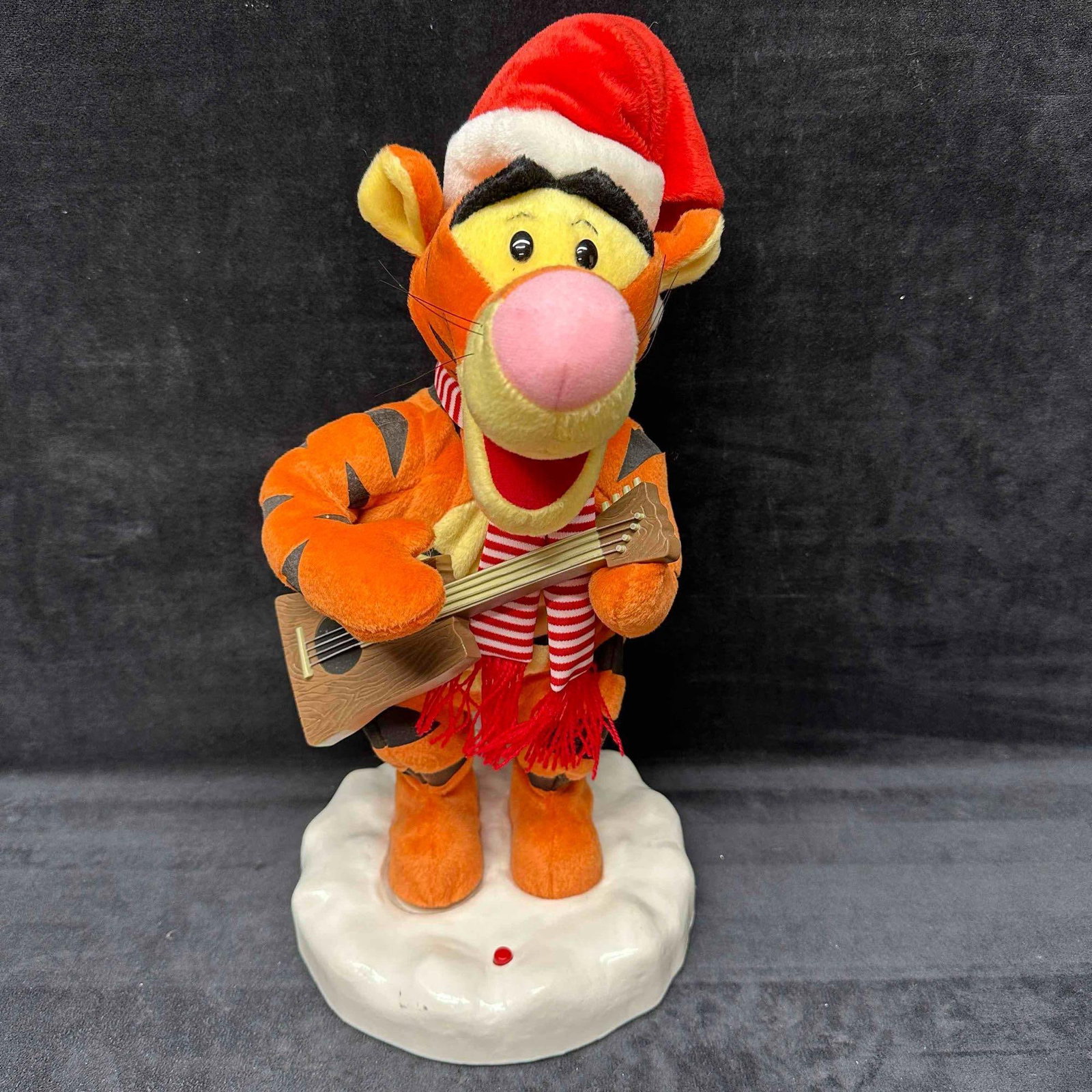 Gemmy 16" Animated Musical Tigger Santa Claus is Coming to Town: Tested. Fully Functional. This item is in good pre-owned, previously displayed condition with light wear, and surface scratches. Please see all photos for full details. Tigger: 16 1/4" tall x 8 1