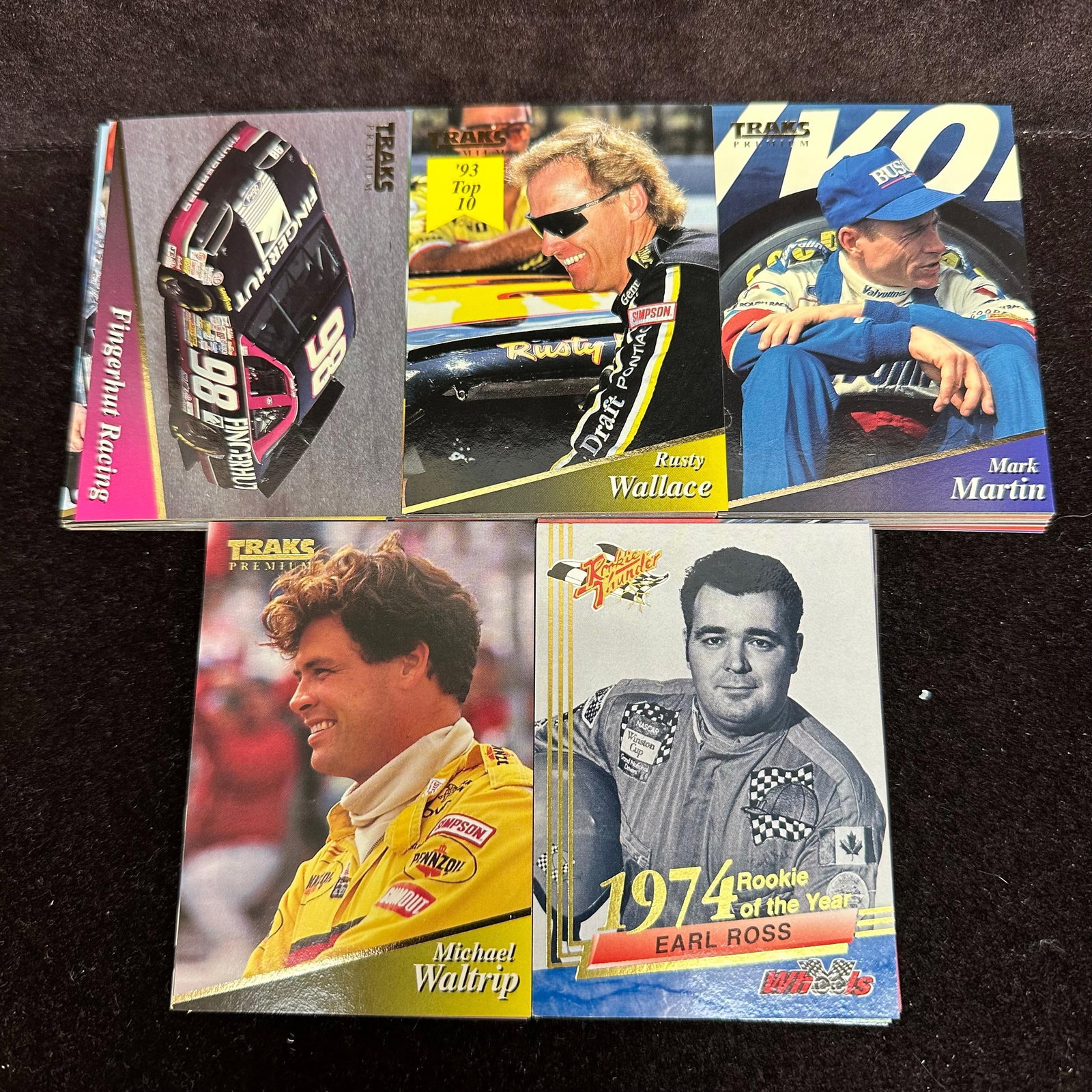 100 Card Lot NASCAR Traks Premium Trading Cards Rusty Wallace Mark Martin Waltrip: Large group of NASCAR Traks Premium trading cards featuring drivers and racing teams. Cards pictured include examples such as Rusty Wallace, Mark Martin, Michael Waltrip, Brett Bodine, Sterling Marlin