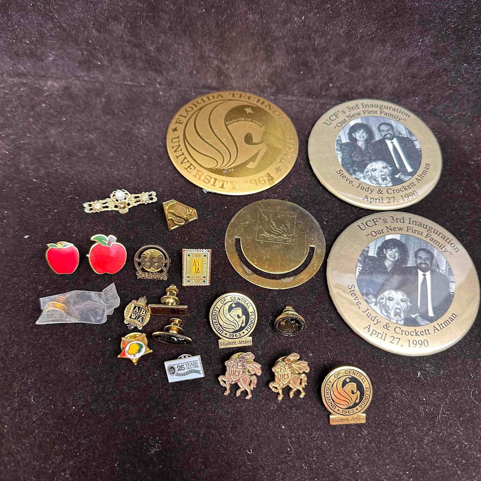 Teacher Educator’s Lapel Pin Collection UCF Affiliated Theme Lot: Collection of assorted vintage educator’s lapel pins, many affiliated with the University of Central Florida (formerly Florida Technological University). Includes UCF inauguration buttons (1990), st