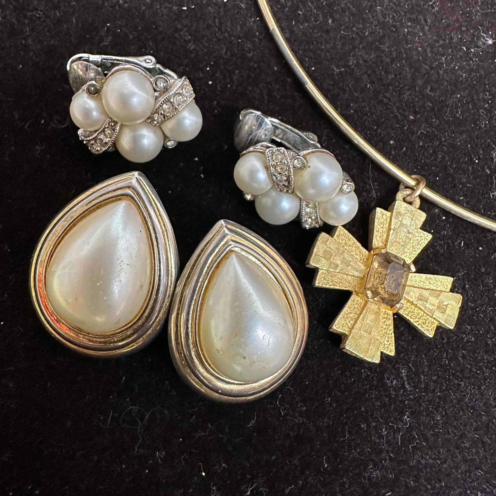 Vintage Marvella Costume Jewelry Lot Earrings and Choker Style Necklace K24: Collection of signed Marvella costume jewelry. Includes a pair of faux pearl and rhinestone cluster clip-on earrings, oversized teardrop faux pearl earrings with gold tone trim, and a gold tone choker