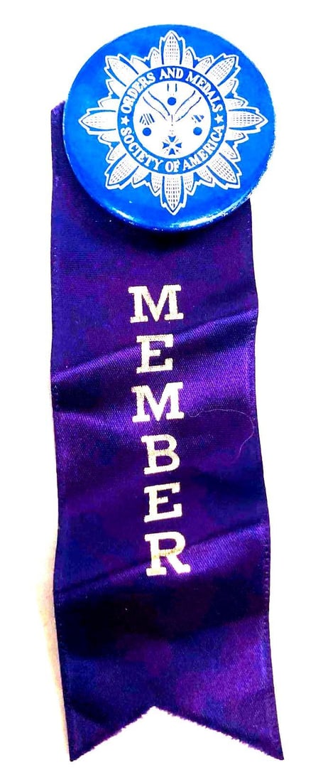 Orders & Medals Society Of America Member Ribbon: This lot contains an Orders & Medals Society Of America Member Pin/Ribbon. The ribbon/pin is approx 6 1/4" x 1 3/4" and weighs about 5.6grams. Overall the ribbon/pin is in good used condition with som