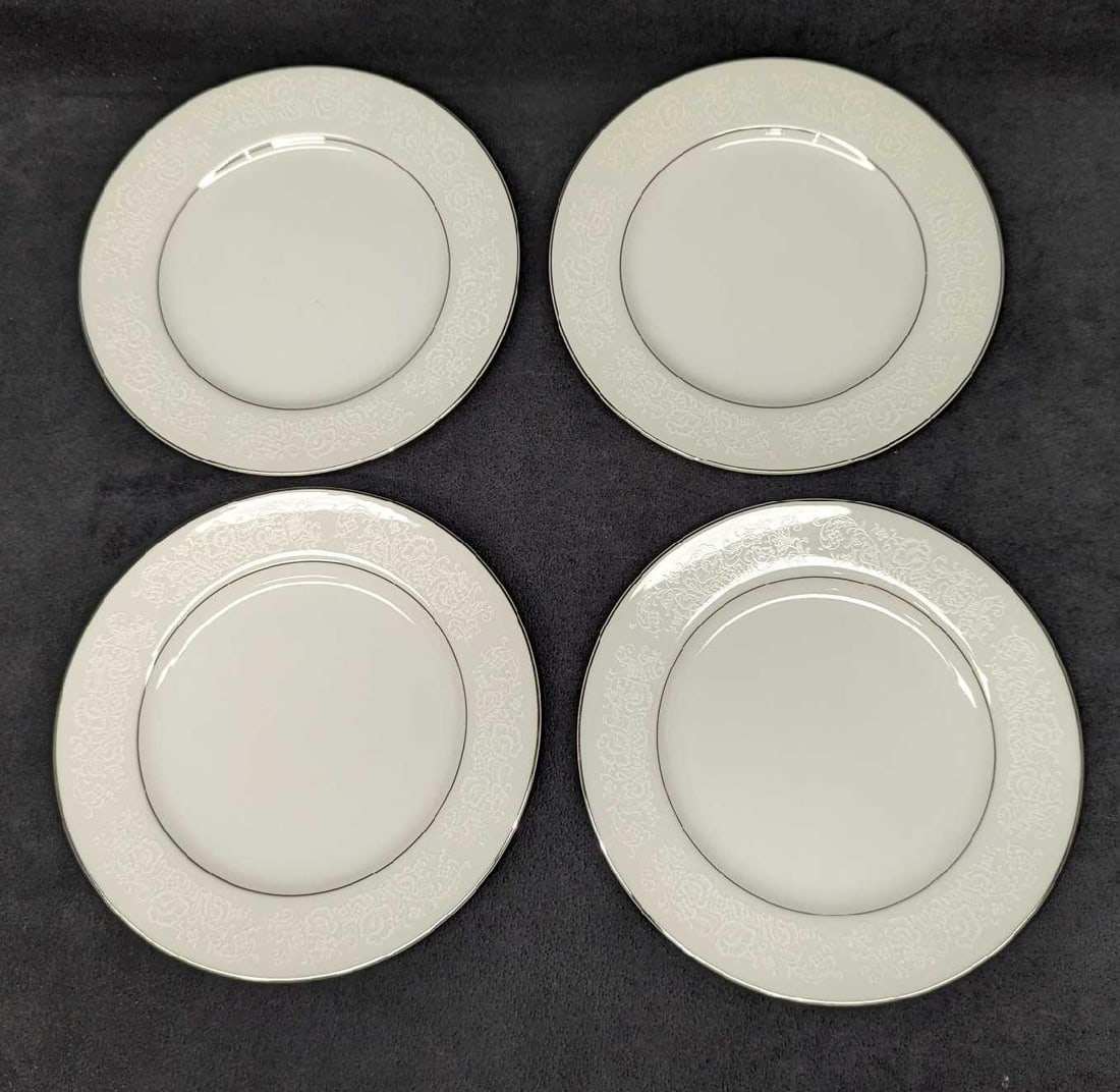 4 Retired International Fine China Juliet Salad Plates C: 4 Retired International Fine China Juliet Salad Plates C. Each plate is approx 7 5/8" x 7 5/8" x 3/4" and the total weight is 2.37 lbs. The plates do not have any chips or cracks.