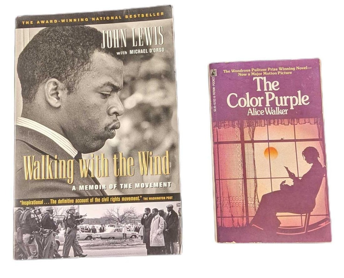 Walking With The Wind And The Color Purple Paperbacks: This lot includes: (1) The Color Purple By Alice Walker. This was published by Pocket Books on 1985 (New York). This book is approx 4" x 1" x 7". (1) Walking With The Wind By John Lewis &