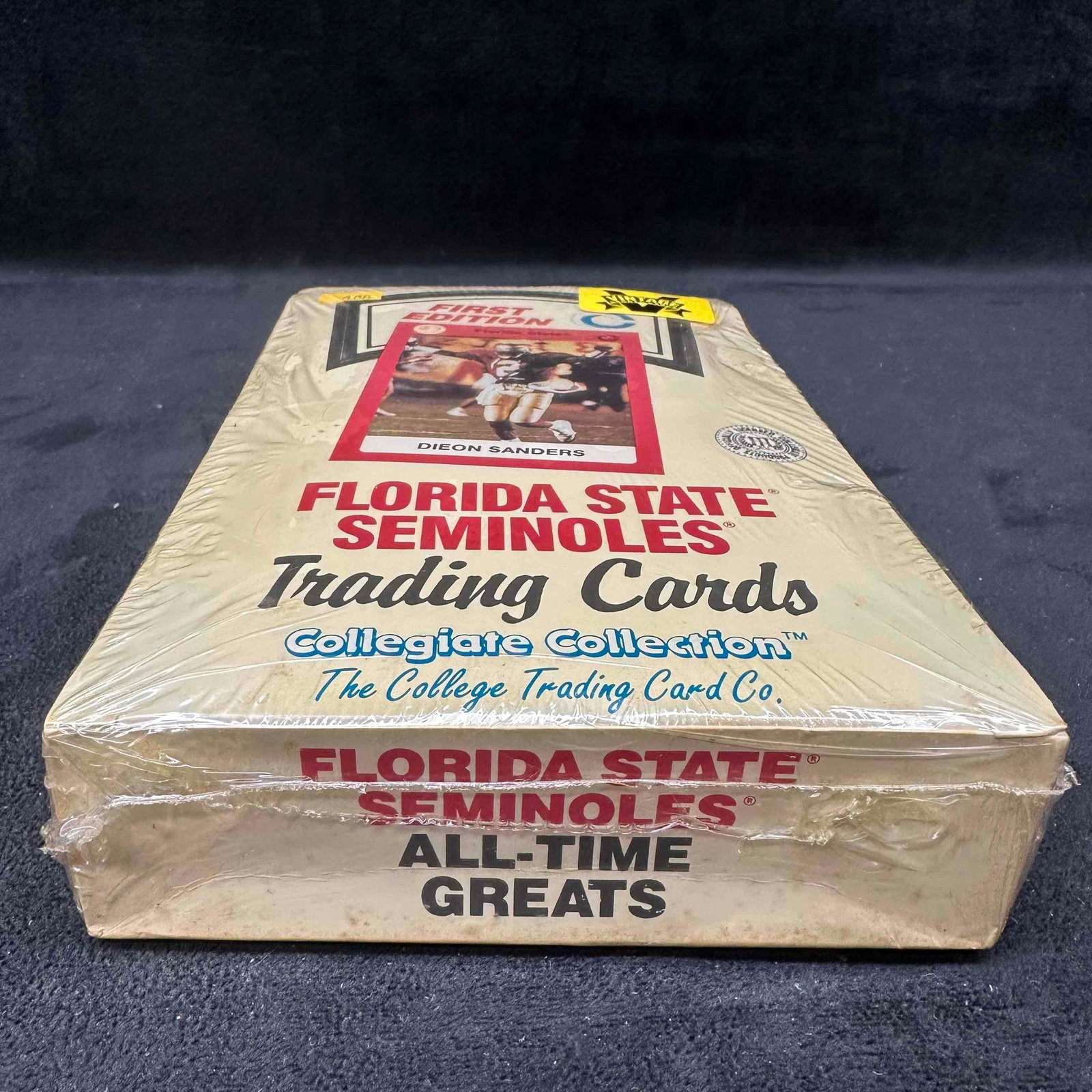 1991 Florida State Seminoles Collegiate Collection First Edition Sealed College Trading Card Box: 1991 Florida State Seminoles Collegiate Collection First Edition Sealed College Trading Card Box. This item is in like new, previously displayed condition with normal light wear, and surface scratches