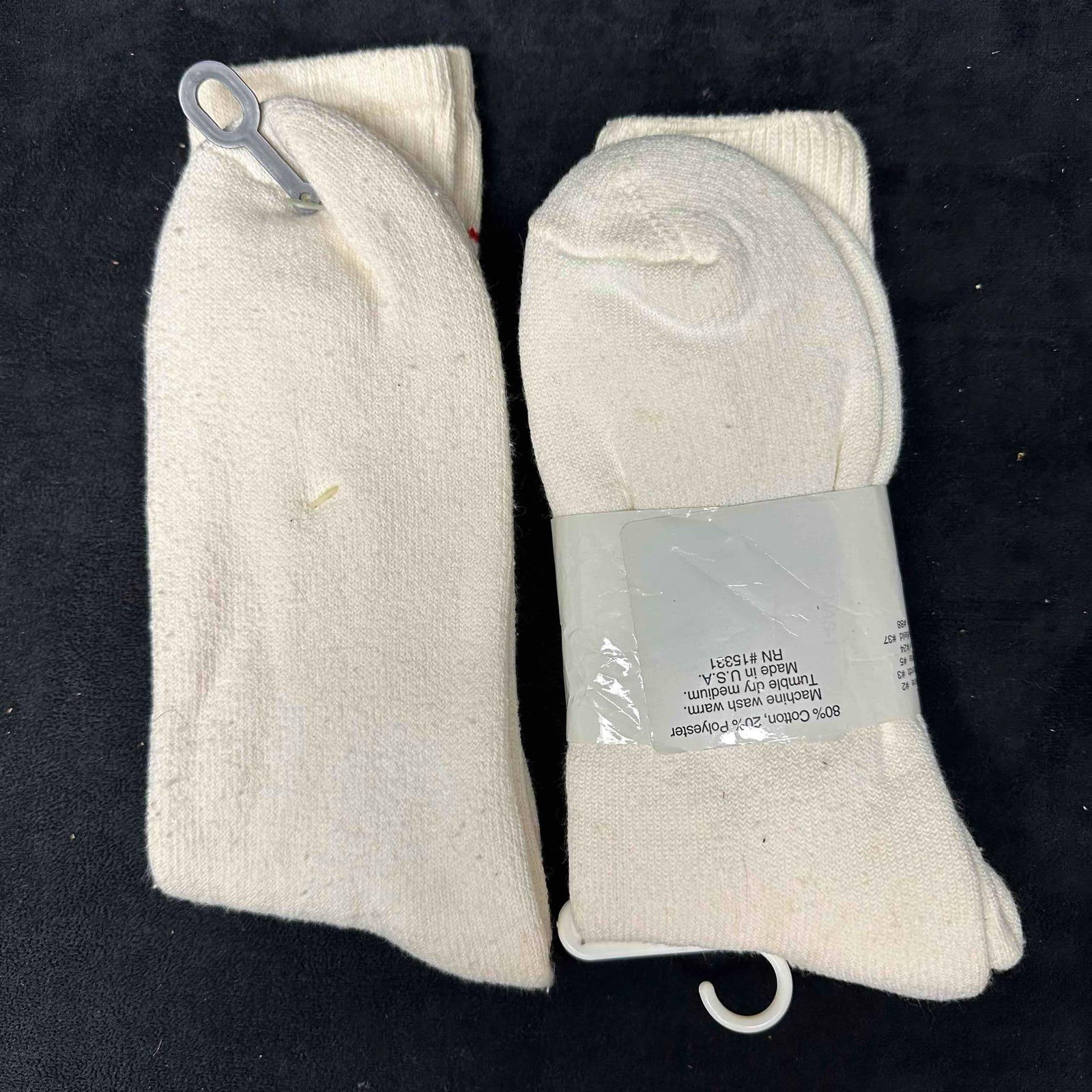 NASCAR Jeff Gordon Socks Lot 2 Pairs: Lot of two pairs of vintage NASCAR Jeff Gordon socks. One pair features the number 24 with "Gordon" lettering and original retail tag. The second pair shows the number 24 with Jeff Gordon’s