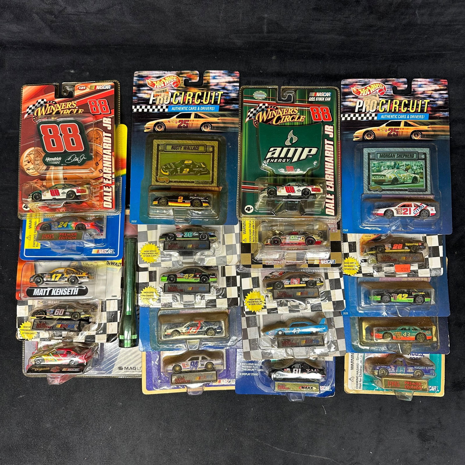 1:64 Scale NASCAR Replica Collectors Stock Cars Hot Wheels Winner's Circle 20 Toy Set: Various variety of NASCAR replica stock 1:64 scale die-cast cars from Racing Champions, Hot Wheels, and Winner's Circle. Several NASCAR sponsor brands featured, such as DeWalt, Mello Yello, Mounta