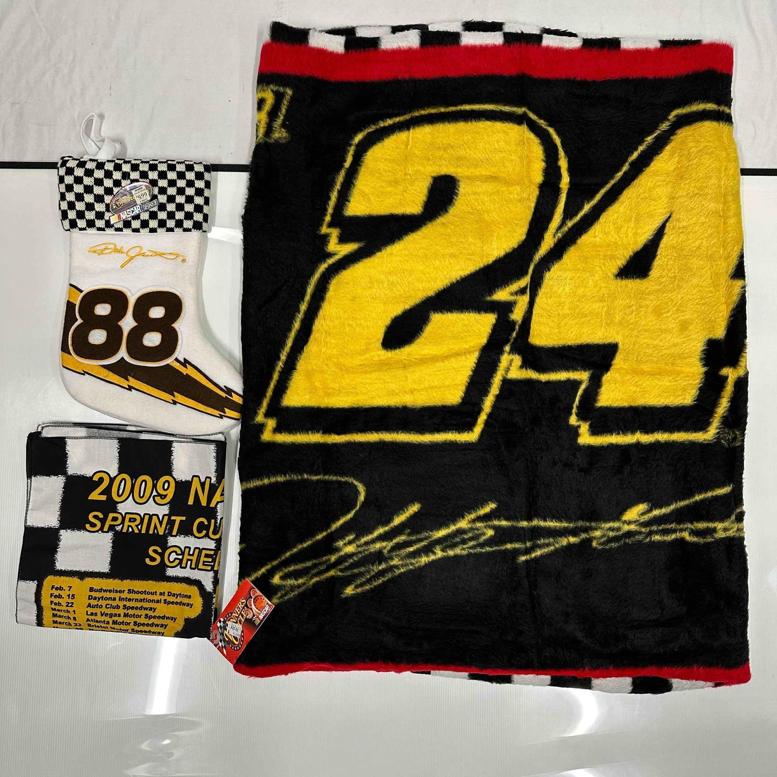 NASCAR Sports Memorabilia Blanket Christmas Stocking Handkerchief Set Jeff Gordon 24: NASCAR Sports Memorabilia Blanket Christmas Stocking Handkerchief Set Jeff Gordon 24. The Christmas stocking and handkerchief have original tag still intact. These items are in good like new and pre-o