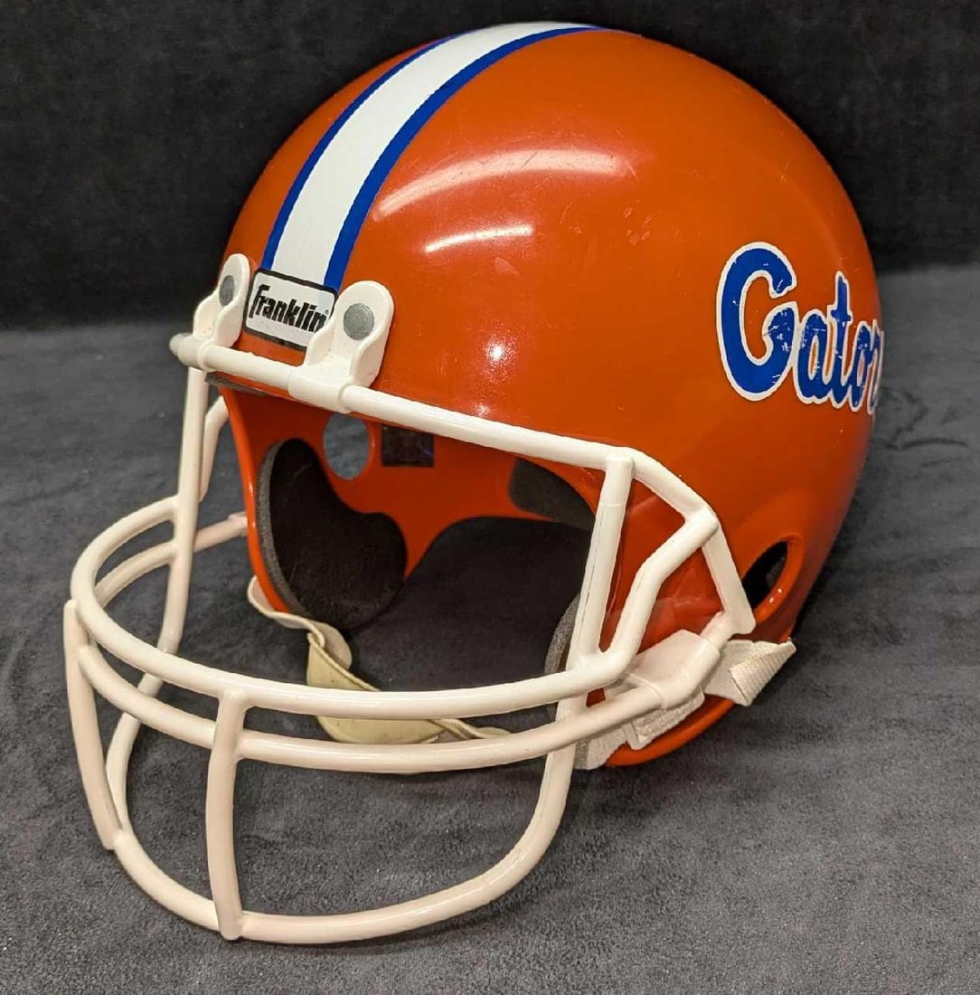 Vintage Florida Gators Franklin Youth Costume Helmet: Vintage Florida Gators Franklin Youth Costume Helmet. Not meant to be worn for use in actual football (or any other contact sport) activity. This is approx 12" x 8" x 8 1/2" and it weighs 1lb. There i