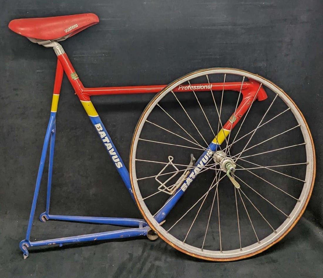 Batavus Professional Bicycle Frame With Seat & Wheel: Batavus Professional Bicycle Frame With Seat & Wheel. "Time Trial" frame with a "Prestige" sat and one Fiamme wheel. The frame and seat are approx 32" x 5" x 30 1/2" and it weighs 6lbs. The frame and