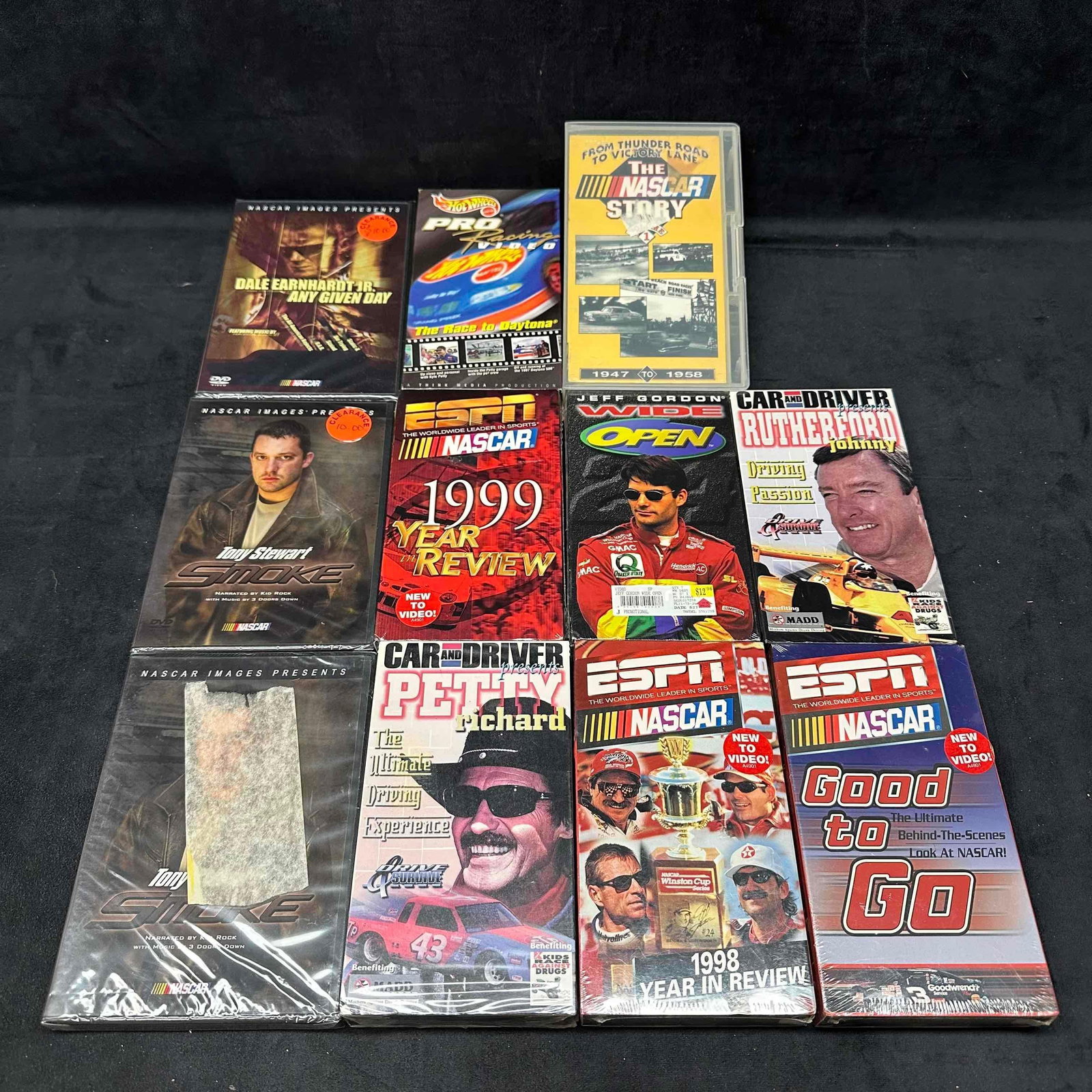 NASCAR VHS and DVD Media Set ESPN Hot Wheels Jeff Gordon Eleven 11: NASCAR VHS and DVD Media Set ESPN Hot Wheels Jeff Gordon Eleven 11. All except one (Hot Wheels) VHS and DVD's are in like new sealed in original plastic. These items are in like new and pre-owned,