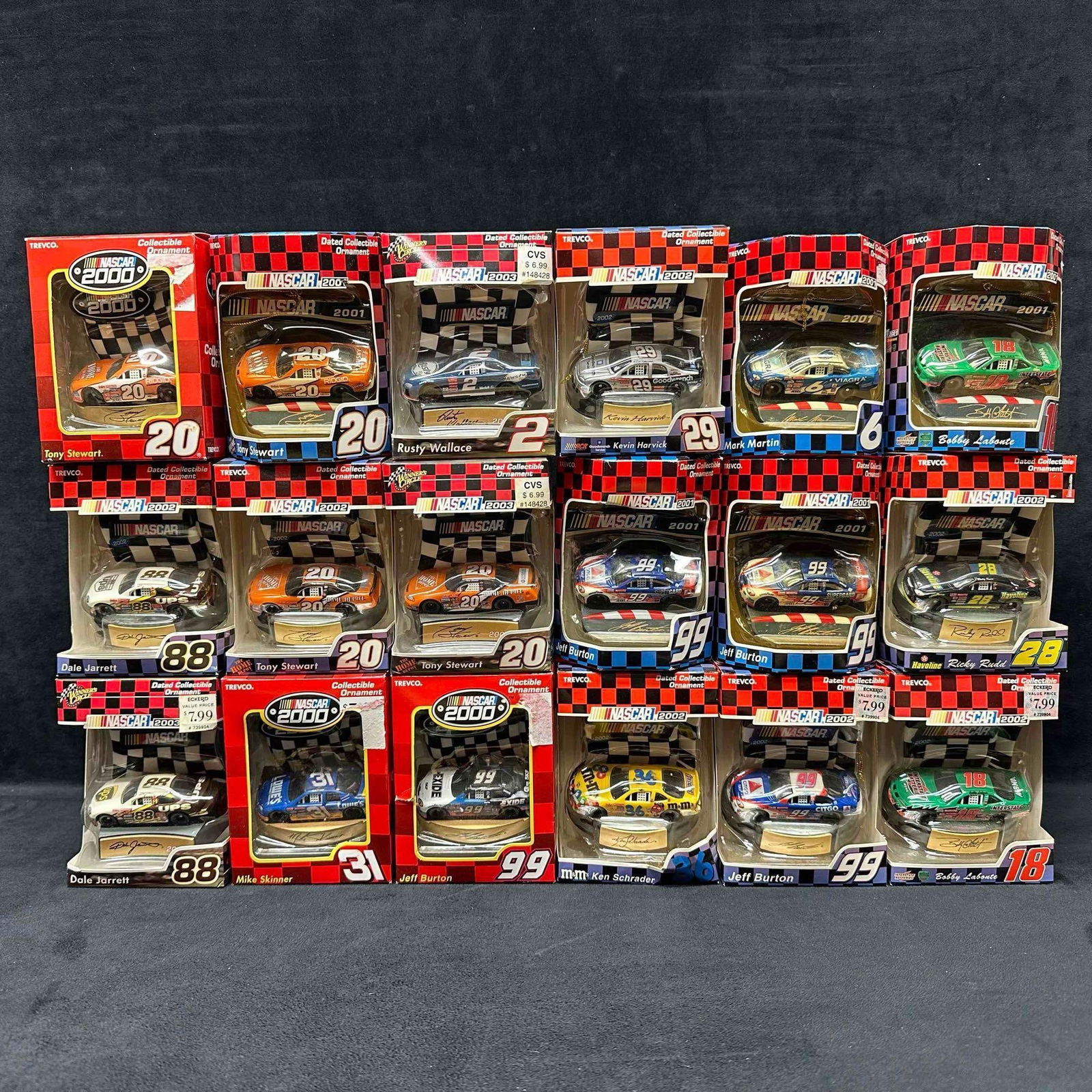 NASCAR Collectible Ornament Set Eighteen Dated Nascar Ornaments: NASCAR Collectible Ornament Set Eighteen Dated Nascar Ornaments. Trevco brand collectible holiday ornaments featuring several NASCAR stock cars. Eighteen ornaments with some duplicates. These items ar