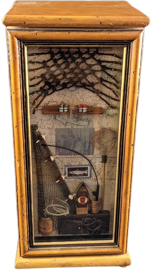 Fun Wooden Fishing Themed Mini Cabinet: Small wooden cabinet that looks like an fun fishing themed shadow-box at first glance. There is an map, fishing pole, net, barrel and more behind the glass. This also opens up to reveal three small sh