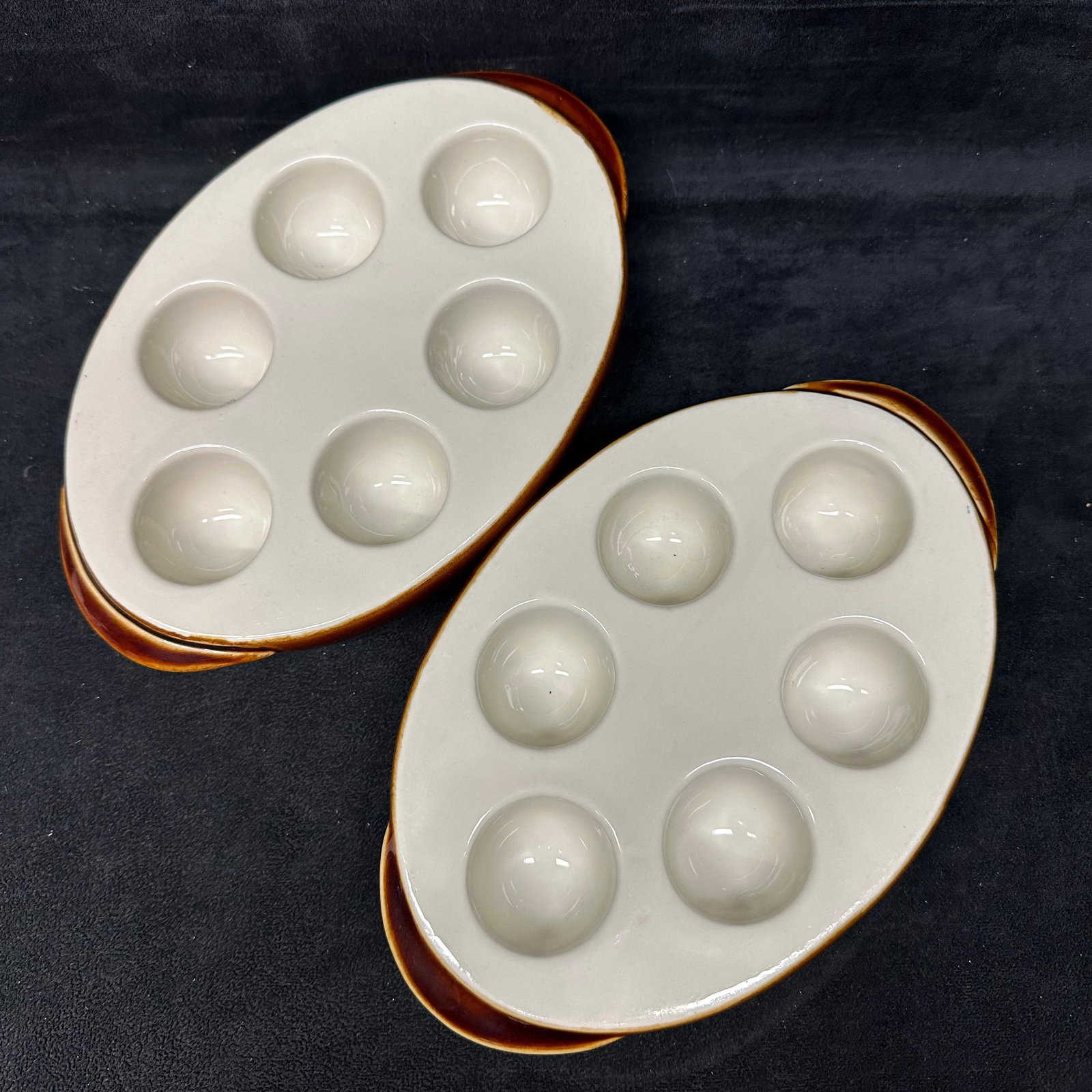 Pair Hall China Lenox Escargot Serving Baking Dishes No. 1194 Brown Glaze: Two Hall China Company escargot serving dishes, pattern No. 1194, marked Lenox Escargot on the underside labels. Each dish features six recessed wells and integrated side handles, with cream interior