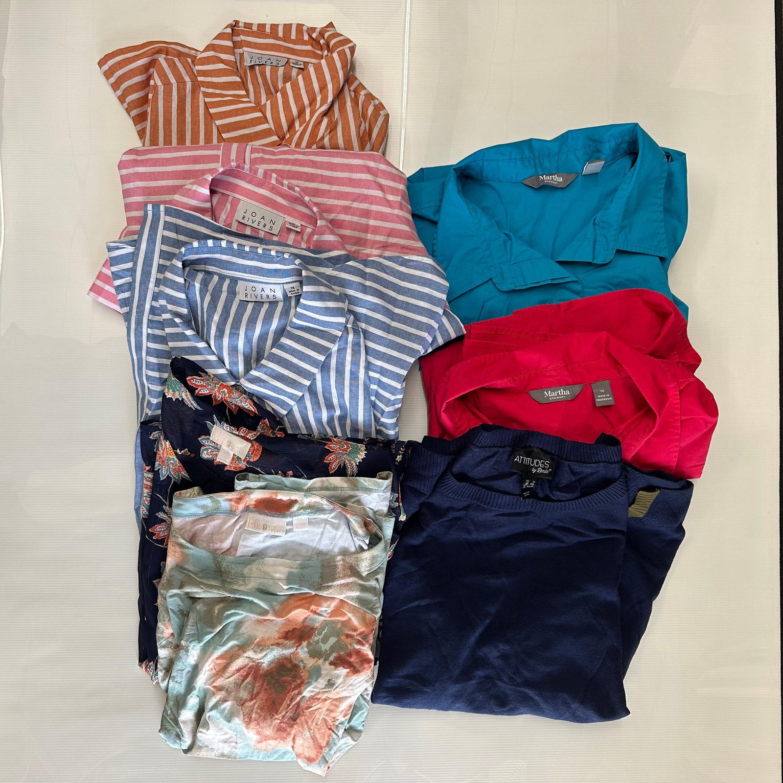 Womens Clothing Lot Size 1X Joan Rivers Martha Stewart Mixed Tops: Group of women's tops all size 1X. Includes Joan Rivers striped tops, Martha Stewart button front shirts, Attitudes by Renee top, and additional patterned blouses. Mixed colors and styles. Pre-own
