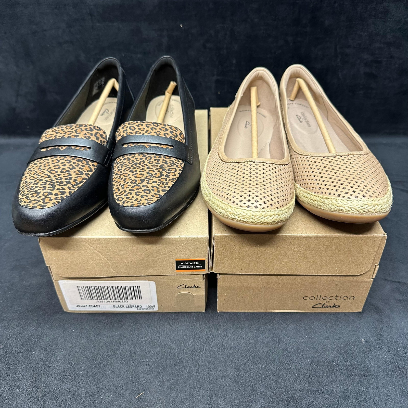 2 Pairs Clarks Women’s Shoes Juliet Coast Black Leopard Loafers and Tan Perforated Flats Wide: A lot of two pairs of Clarks womens shoes, both in original boxes. Includes Juliet Coast black leather loafers with leopard print detail (labeled Wide Width 10W) and tan perforated slip-on flats (10W)