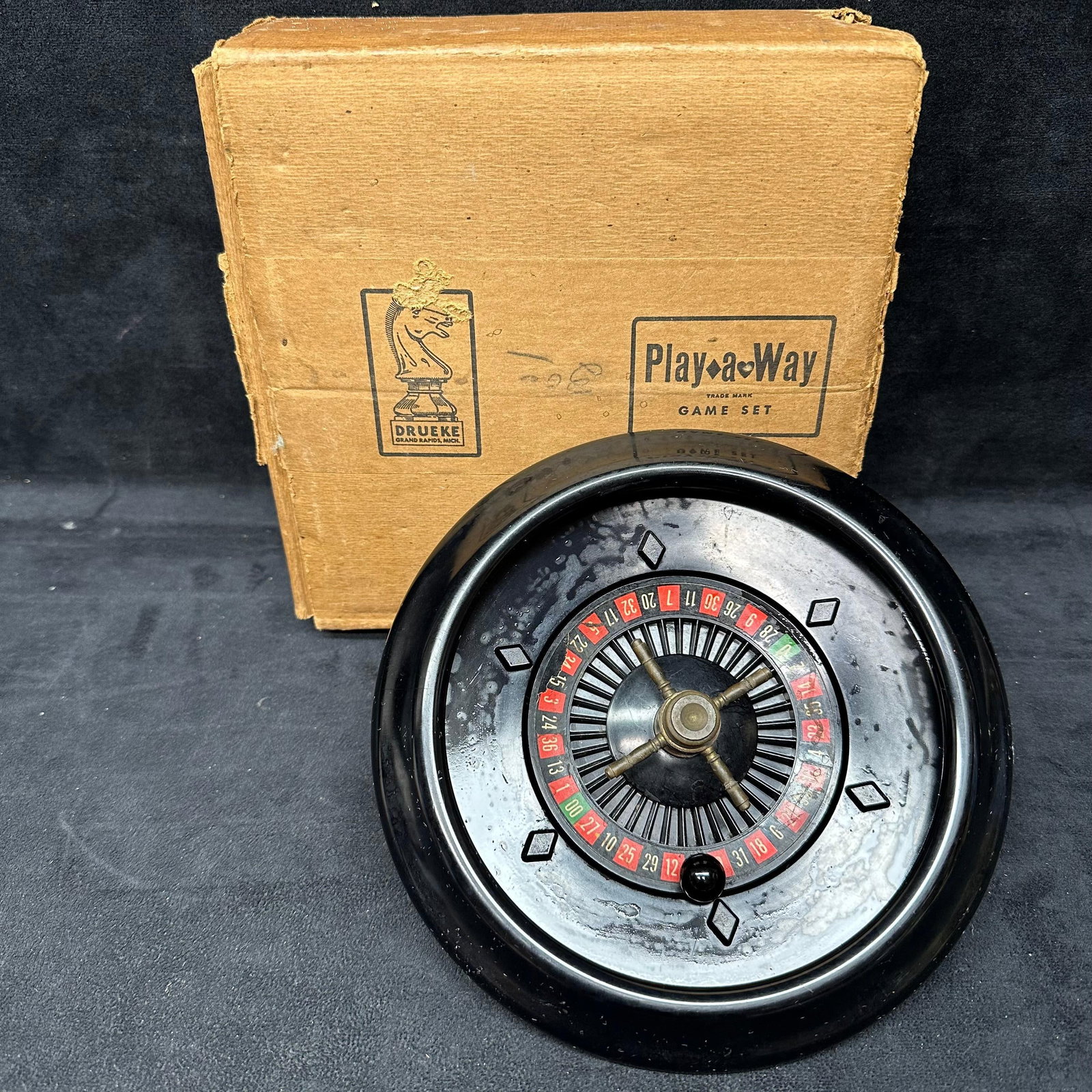 Roulette Wheel Drueke Play A Way Bakelite with Box: Roulette Wheel Set Drueke Play A Way Bakelite with Original Box. Three pieces included. This item is in good pre-owned, previously displayed condition with light wear and surface markings. Please refe