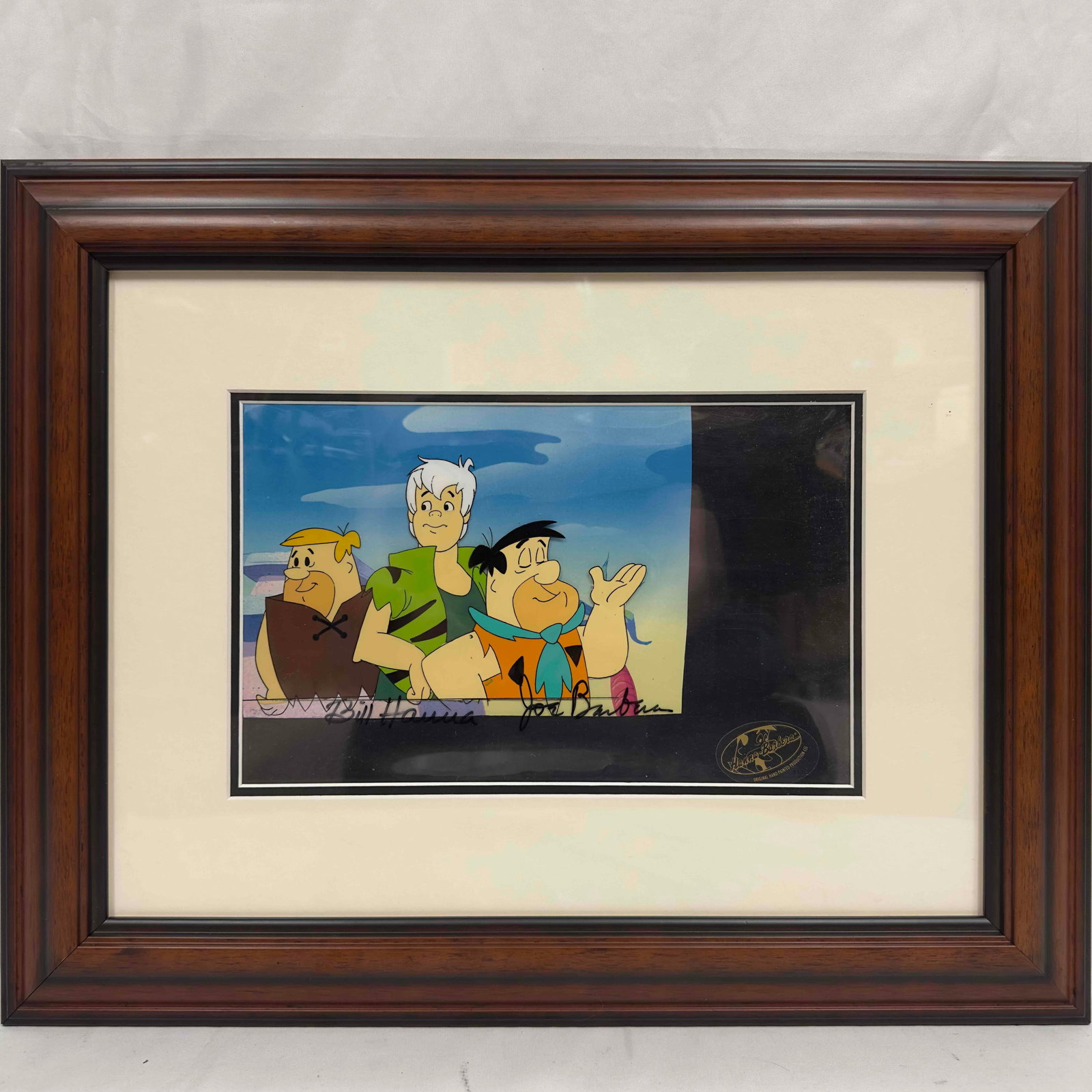 Hanna-Barbera Studio Hollyrock-a-Bye Baby Wise Fred Hand Painted Production Cel Signed Hanna-Barbera: Hanna-Barbera Studio Hollyrock-a-Bye Baby Wise Fred 1999 Hand Painted Production Cel Signed William Hanna Joseph Barbera. Hand painted production cel with color background. Signed by William Hanna and