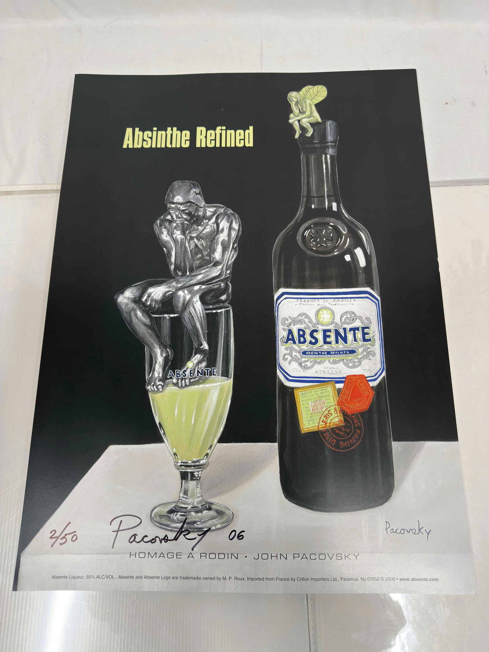 Absinthe Refined Ad Poster Homage A Rodin by John Pacovsky Hand Signed and Numbered Set 45 Posters: Absinthe Refined Ad Poster Homage A Rodin by John Pacovsky Hand Signed and Numbered Set 45 Posters. This set includes forty five (45) hand signed and an individually numbered posters by John Pacovsky.