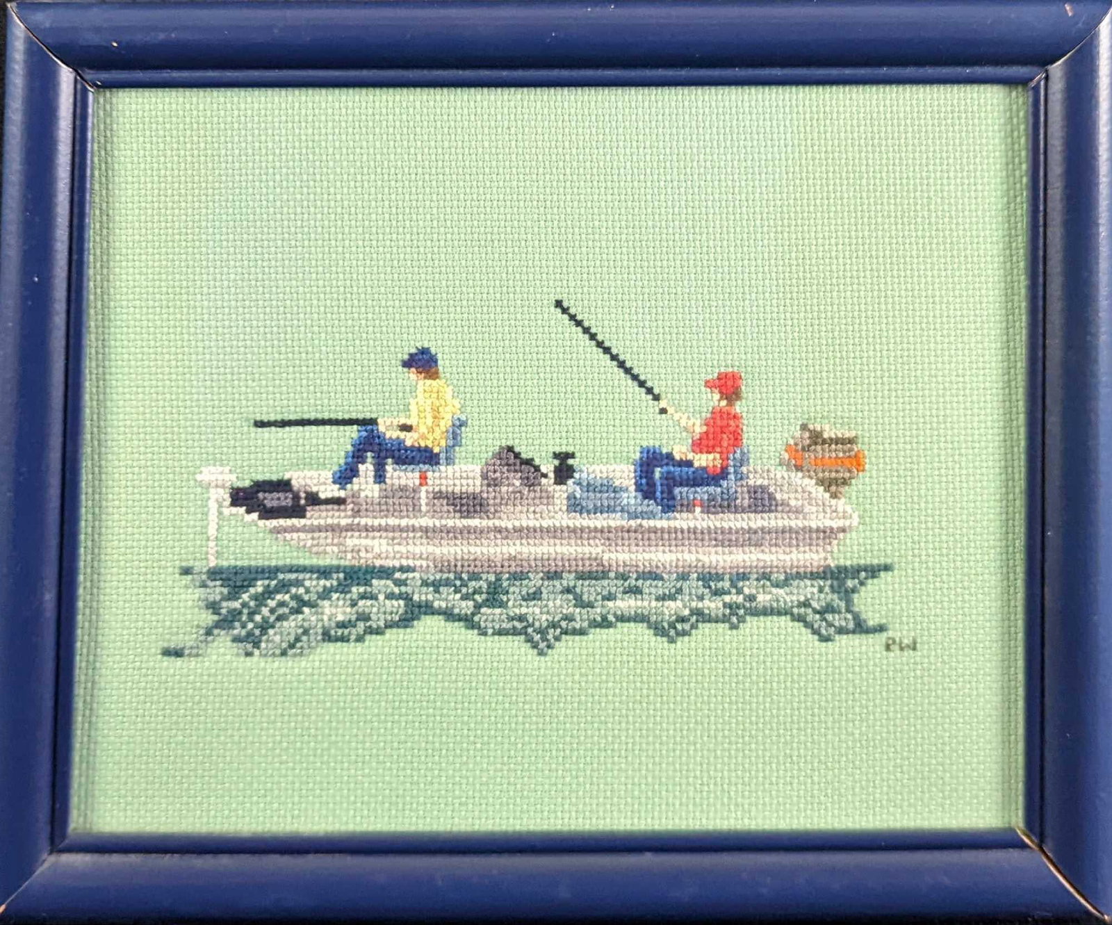 Framed Fishermen On Boat Cross Stich: Framed Fishermen On Boat Cross Stich. Has a little cross-stitch signature on the right. The framed cross stitch is approx 11 1/4" x 1/4" x 9 1/2" and it weighs 1.28lb. The framed cross-stitch is in a