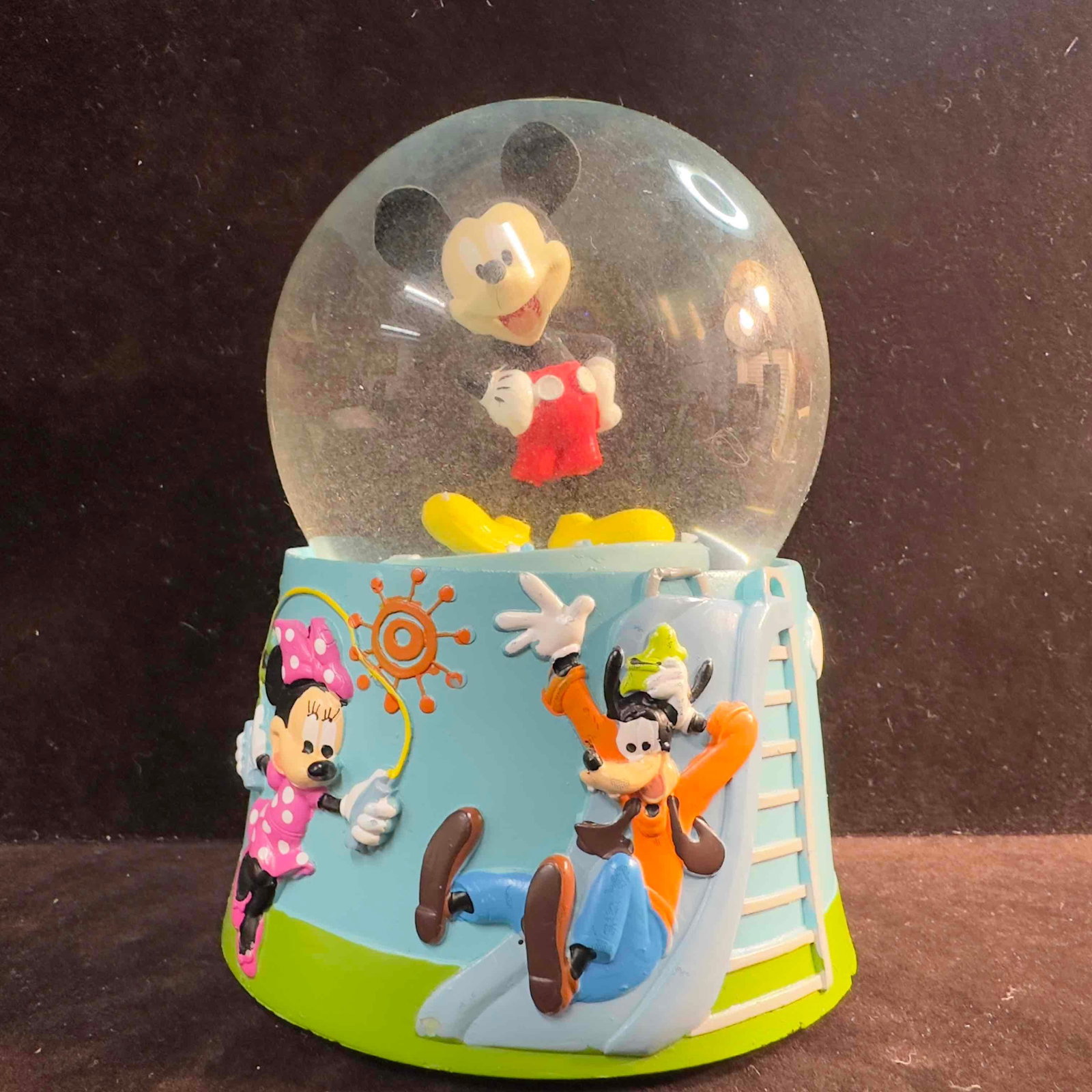 Mickey Mouse Goofy Minnie Mouse Kcare Musical Waterball Snow Globe: Mickey Mouse Goofy Minnie Mouse Kcare Musical Waterball Snow Globe. This Disney Kcare musical snow globe features Goofy, Mickey, and Minnie Mouse in a outside playful theme. Turn key and music Not wor