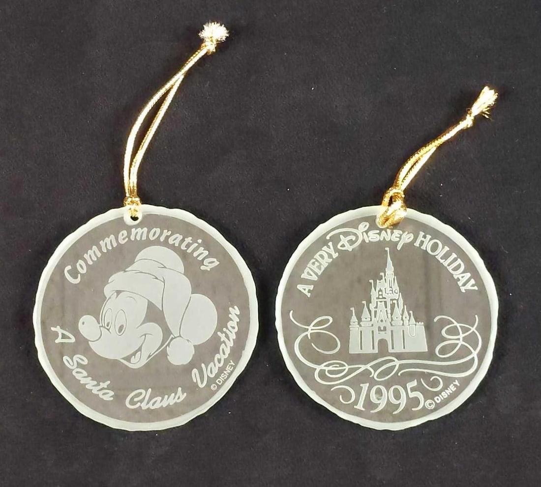 Disney Christmas Glass Ornaments Lot Of Two: This lot includes: (1) American Express "White Glove Treatment - A Very Disney Holiday 1995" Ornament. Limited To American Express Customers. Comes in a box which is approx 5" x 5". T