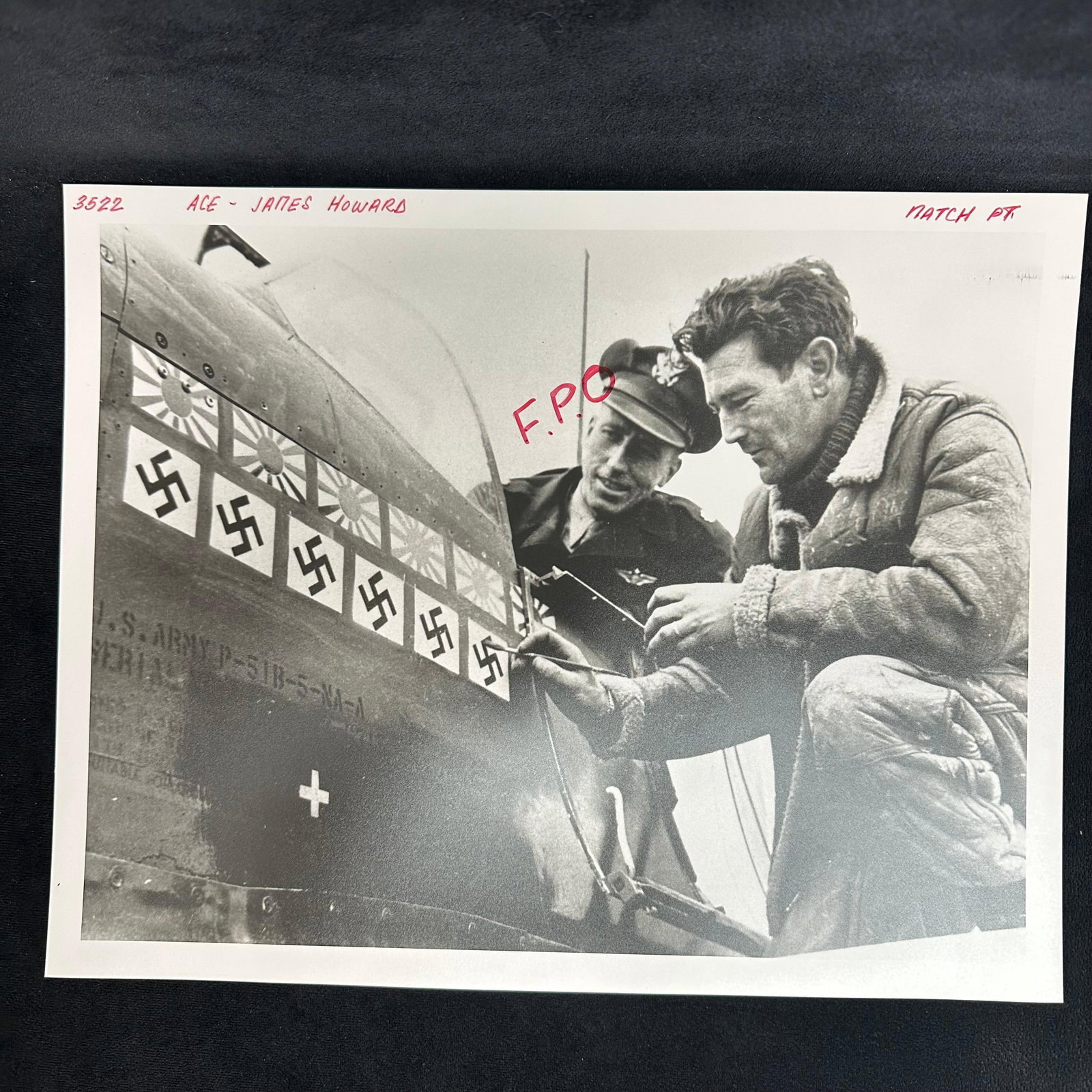 WWII Ace James Howard Black and White Analog Photo Print Fighter Aircraft: Black and white analog photograph print, printed on pearl resin-coated paper featuring WWII flying ace James Howard beside his U.S. Army P-51B Mustang, marking confirmed aerial victories with swastika