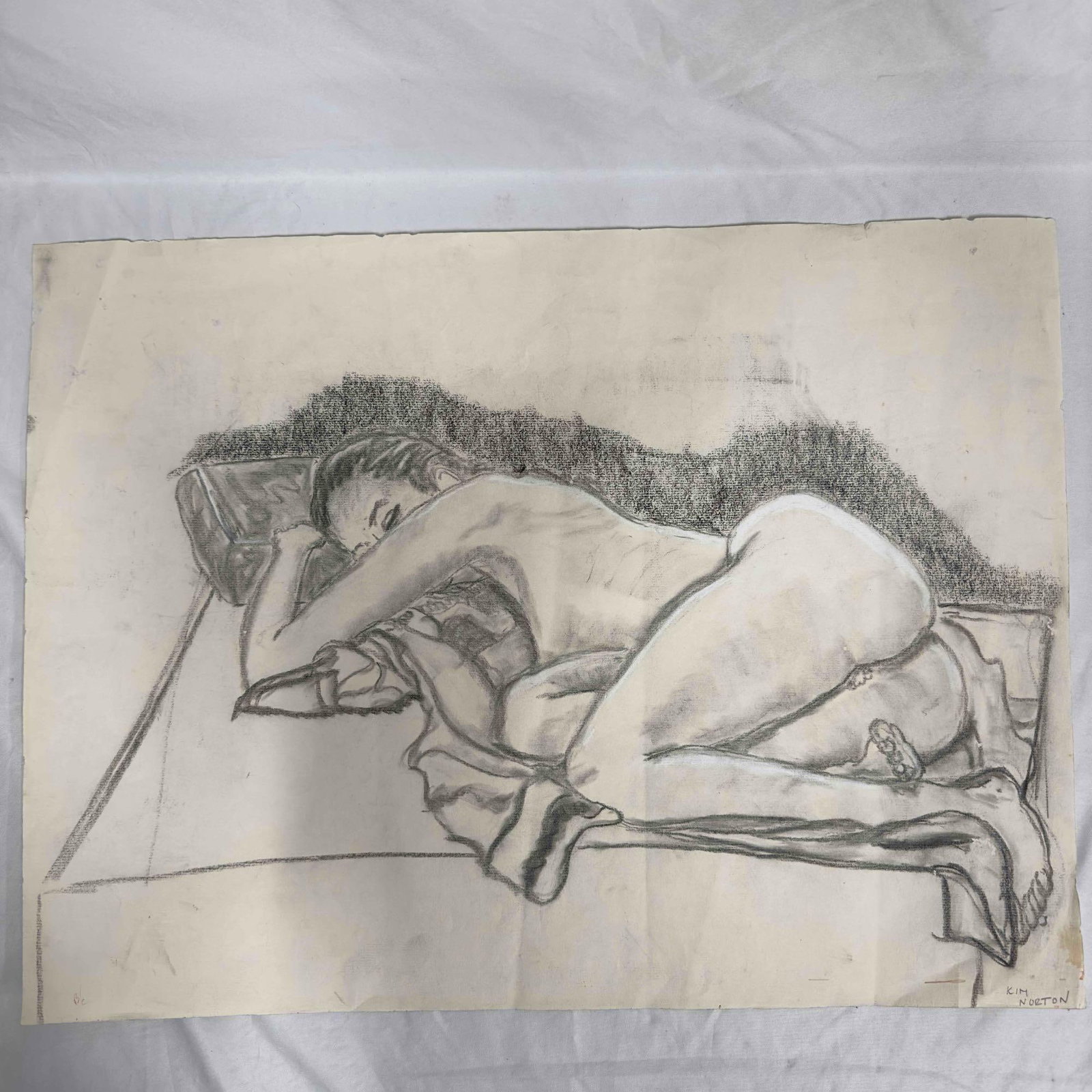 Naked Female Nude Erotic Bare Woman Lady Laying Down Kim Norton Pencil Sketch Drawing: Naked Female Nude Erotic Bare Woman Lady Laying Down Kim Norton Pencil Sketch Drawing. A pencil sketch featuring a nude woman laying down on the bed. Kim Norton written on the bottom right corner. A f