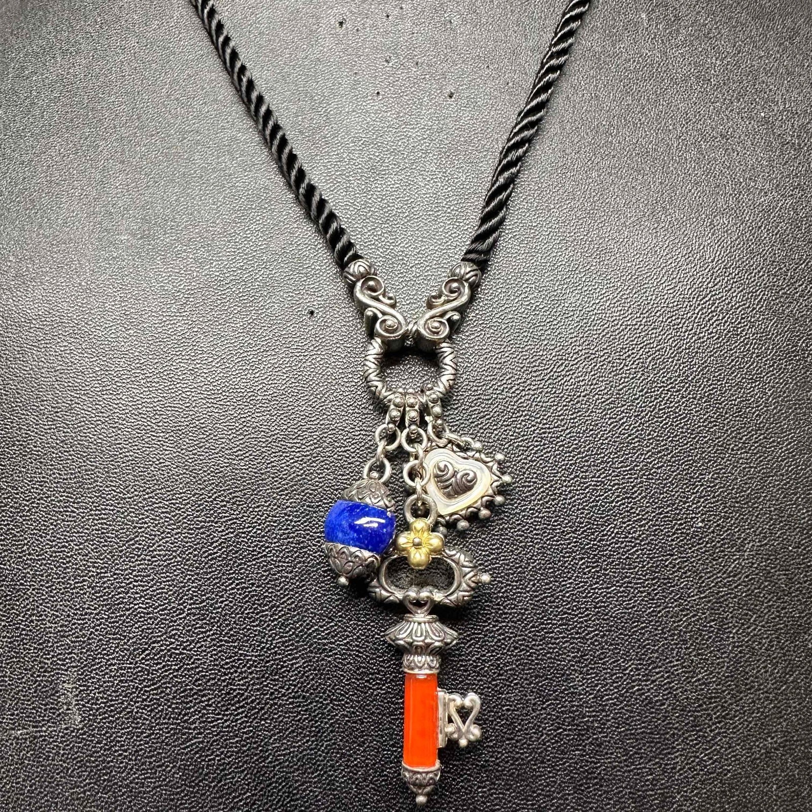 Barbara Bixby Carnelian Lapis 18K Gold Sterling Silver Charm Pendant Necklace: This item is in good pre-owned, previously used/displayed condition with noticeable light wear, and surface scratches. Please reference all photos for full details. This piece of jewelry has been test