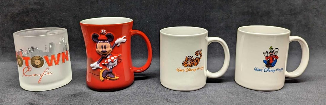 Disney World Minnie & Goofy & Tigger & Motown Cafe Mugs: Disney World Minnie & Goofy & Tigger & Motown Cafe Mugs. This lot includes: (1) Walt Disney World 3D Embossed Minnie Mouse Red Ceramic Mug. This is approx 4 1/2" x 3 1/4" x 4 1/2&