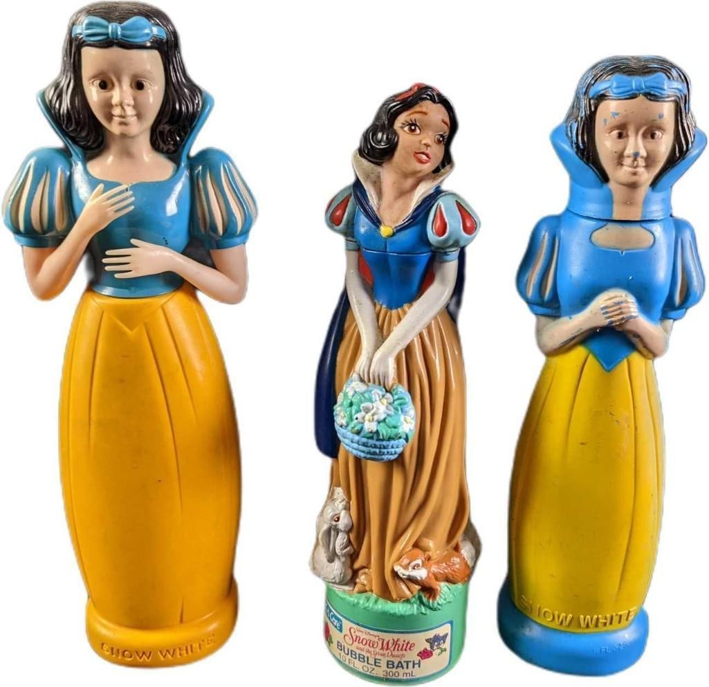3 Vintage Plastic Disney Snow White Shampoo & Soap Bottles: This lot includes: (1) Snow White & The Seven Dwarfs Bubble Bath Bottle By Kid Care. This is approx 3" x 2 1/2" x 9 1/2". (1) Snow White "Soaky" Bottle. From the 1960s. Is app