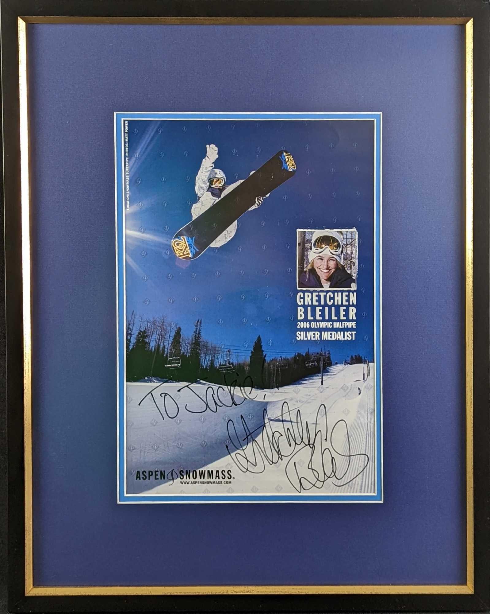 Gretchen Bleiler Autographed Aspen Snowmass Poster Print: Gretchen Bleiler (USA Snowboarder Medal Winner) Hand Signed Color Promo Fold-out Poster. The framed poster print is approx 18 1/2" x 1" x 23 1/2" and it weighs 5lbs. The poster print is ap