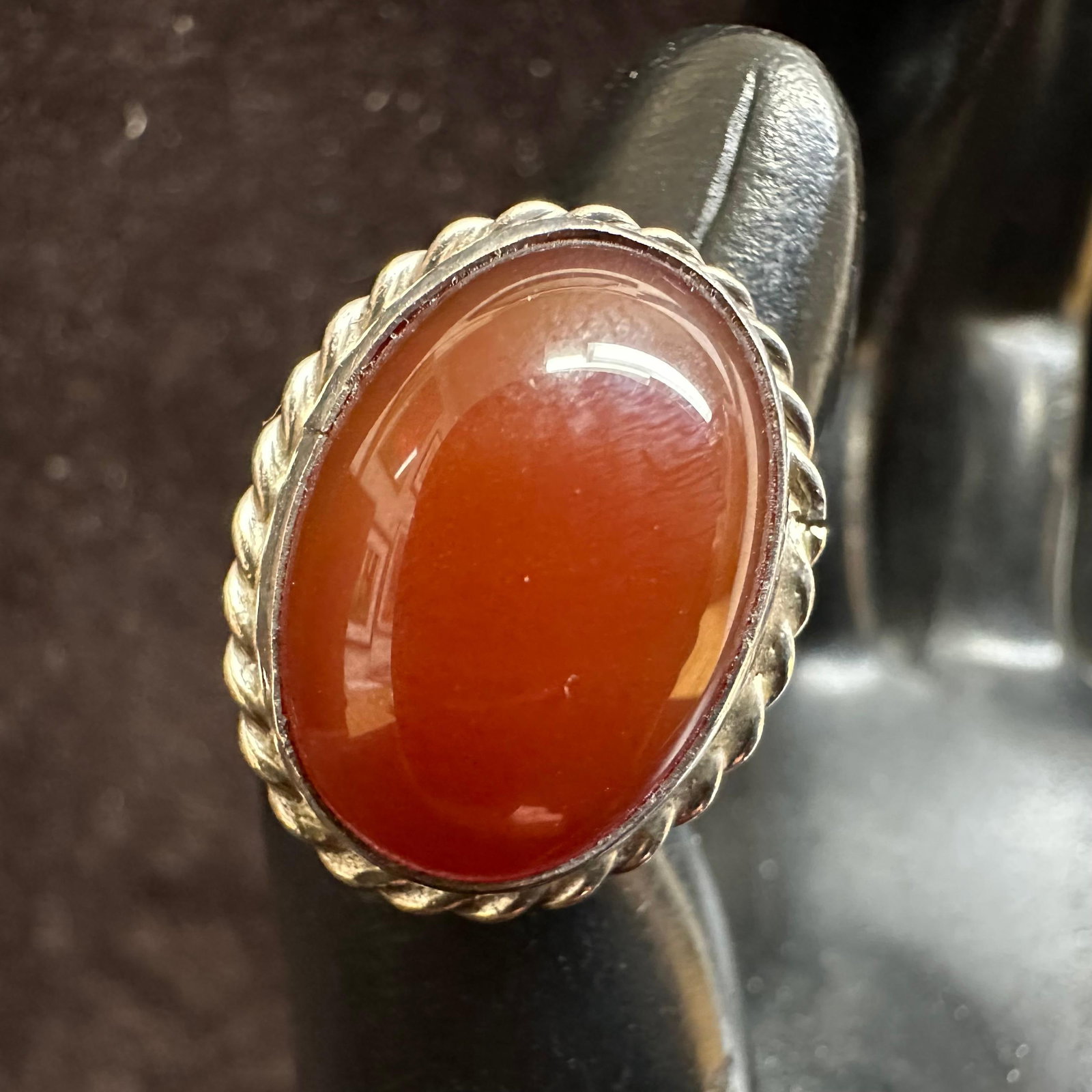 Oval Carnelian Stone Rope Bezel Silver Ring: This item is in good pre-owned, previously used/displayed condition with noticeable light wear and surface scratches. Please reference all photos for full details. This piece of jewelry has been teste