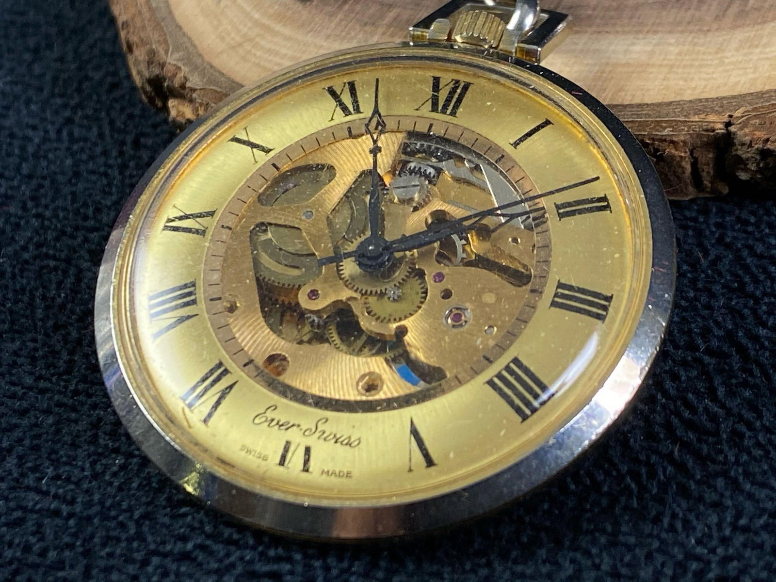 VINTAGE 12 SIZE SKELETONIZED EVER-SWISS POCKET WATCH WITH ROMAN DIAL: This fine piece has been researched and tested prior to listing.Please view all our pictures prior to bidding they are part of our description. Details: Metal - Gold Plated Colo