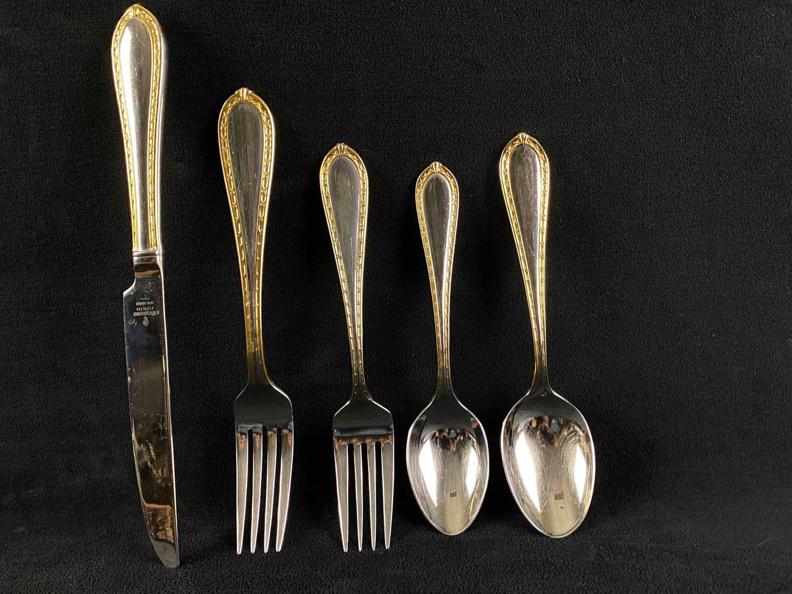 WATERFORD 5 Pc Setting Powerscourt Stainless Gold Accent Flatware (JB): This retired in 2011 5 pc Waterford set is used but in very good condition with zero gold loss includes the following: 1: French Hollow Knife 9 5/8" 1: Individual Salad Fork 7 1/8" 1: Fork