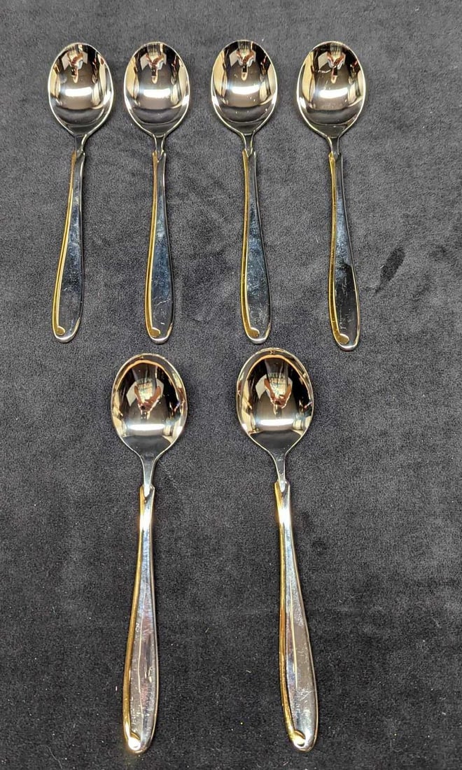 6 Retired Mikasa Estasi Stainless Spoons: 6 Retired Mikasa Estasi Stainless Spoons. This series was released from 1982 - 2004. Each spoon is approx 7 1/4" and together they weigh 0.81b. Made in Japan. The stainless steel spoons are in a good,