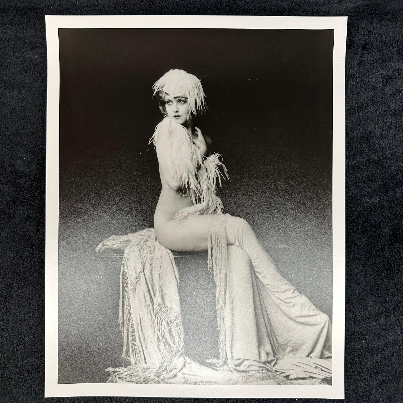 Black and White Ziegfeld Follies Analog Photograph Print Claudia Dell Nude Portrait #2: Original analog photographic print featuring Claudia Dell, a performer with the legendary Ziegfeld Follies. This glamorous nude portrait captures Dell in a classic 1920s pose, adorned with feather acc